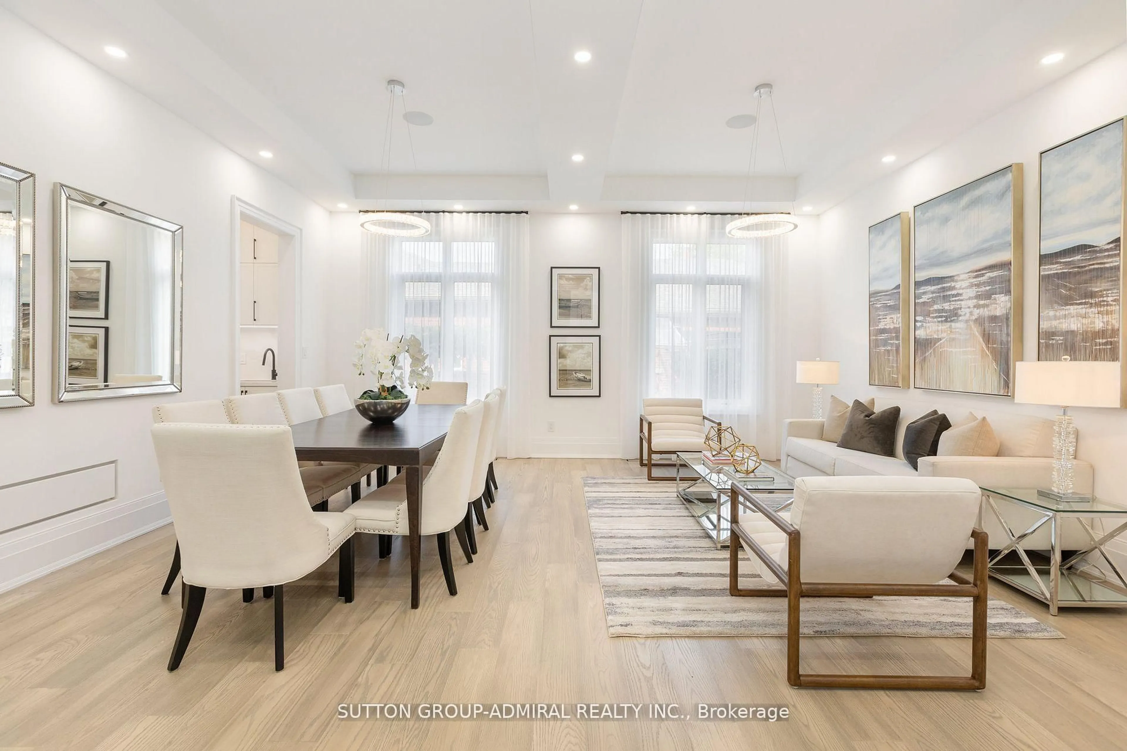 Living room with furniture, wood/laminate floor for 125 Regina Ave, Toronto Ontario M6A 1R8