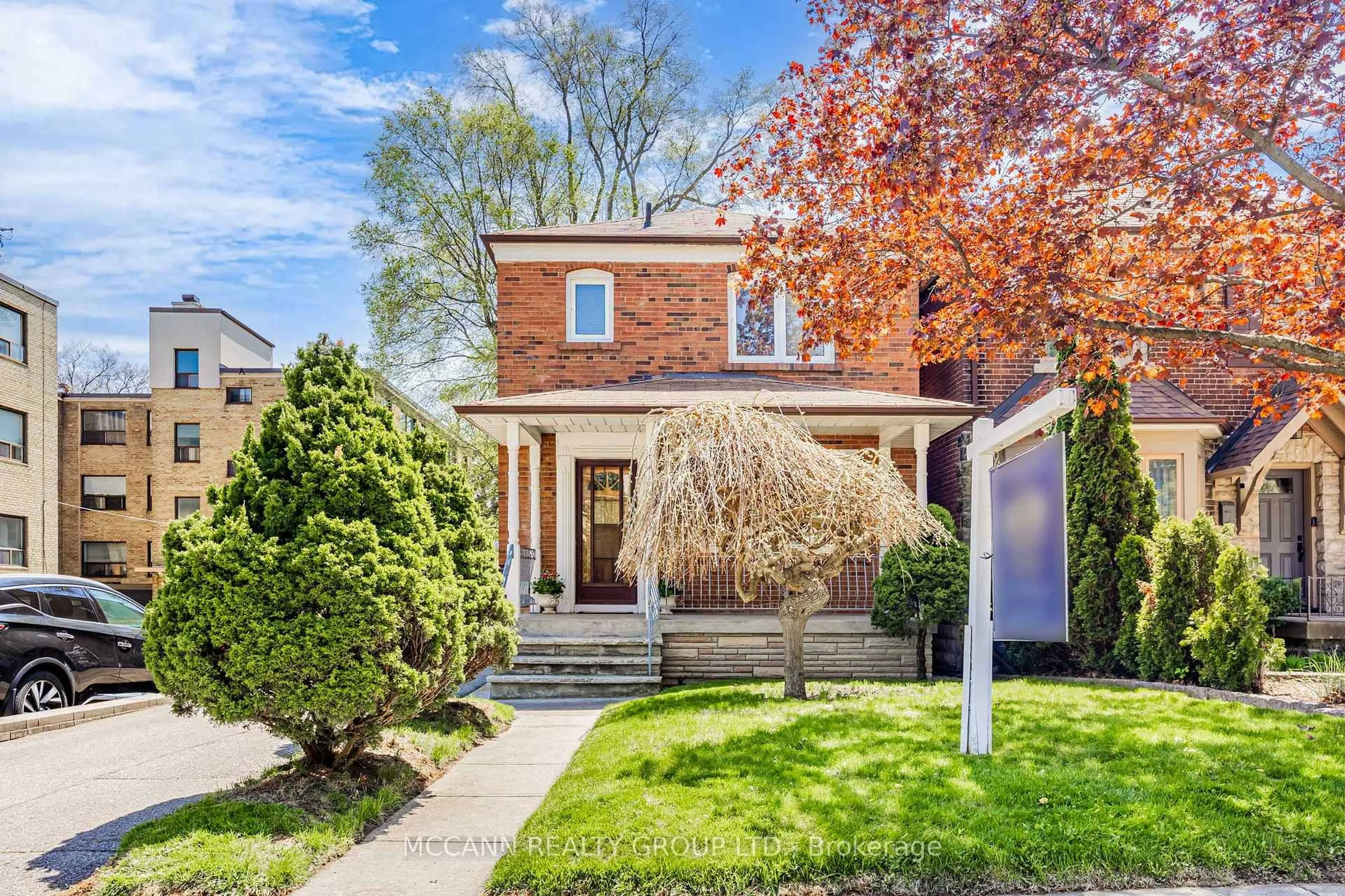 Home with brick exterior material, street for 407 Roselawn Ave, Toronto Ontario M5N 1J9