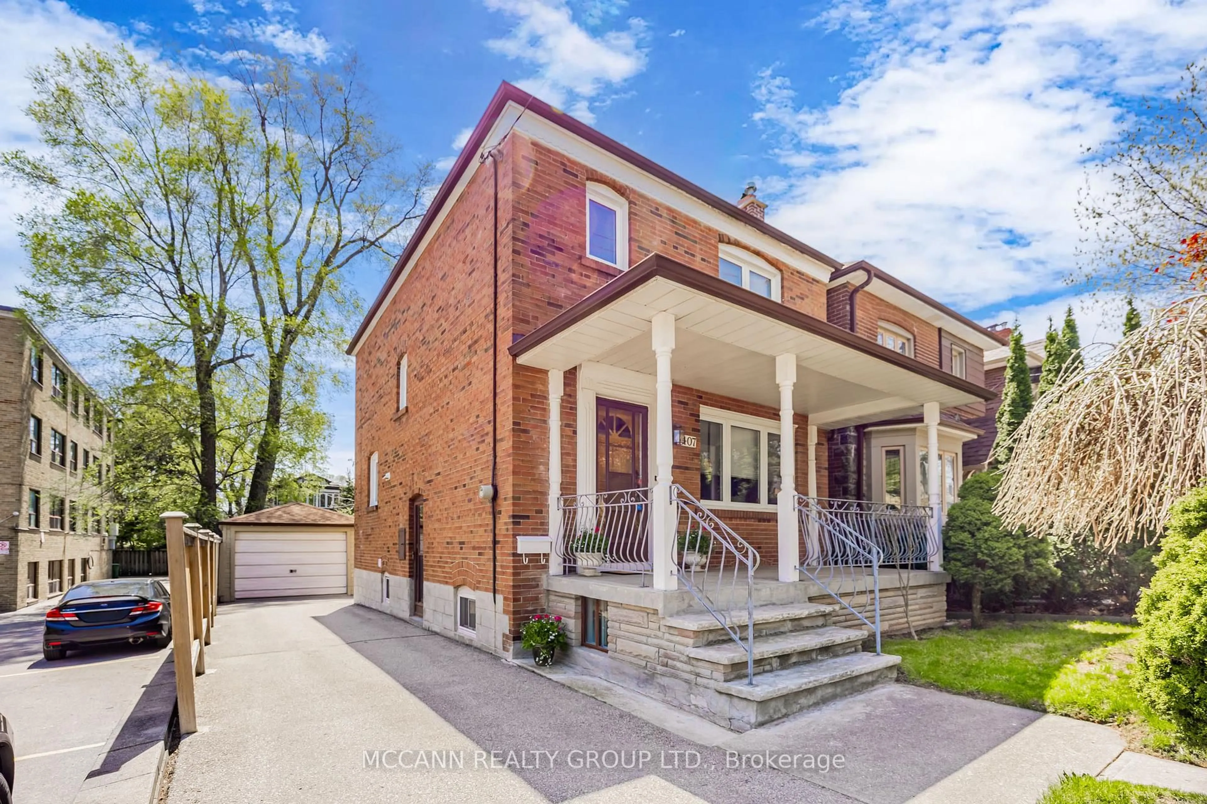 Home with brick exterior material, street for 407 Roselawn Ave, Toronto Ontario M5N 1J9