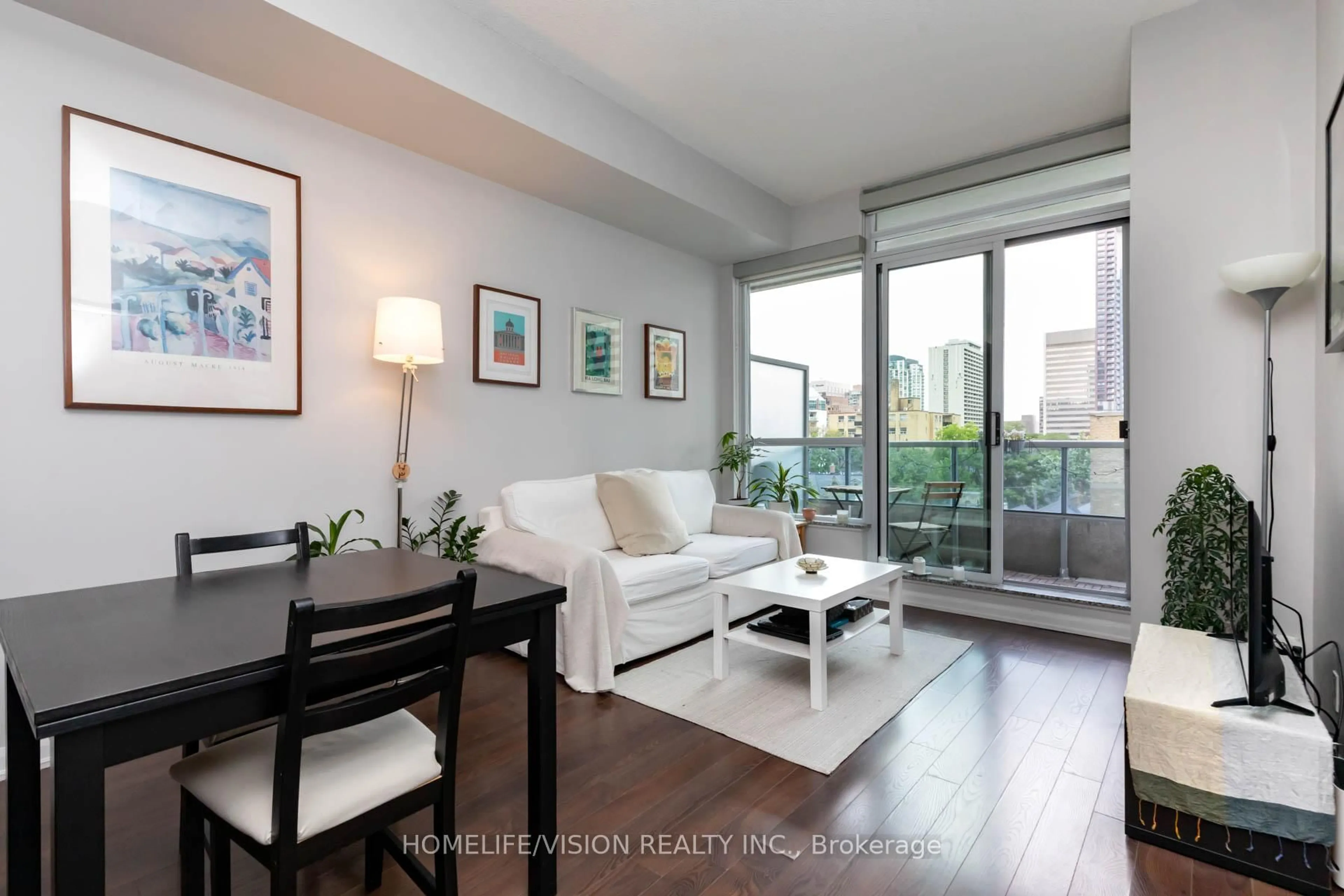 Living room with furniture, wood/laminate floor for 500 Sherbourne St #511, Toronto Ontario M4X 1L1