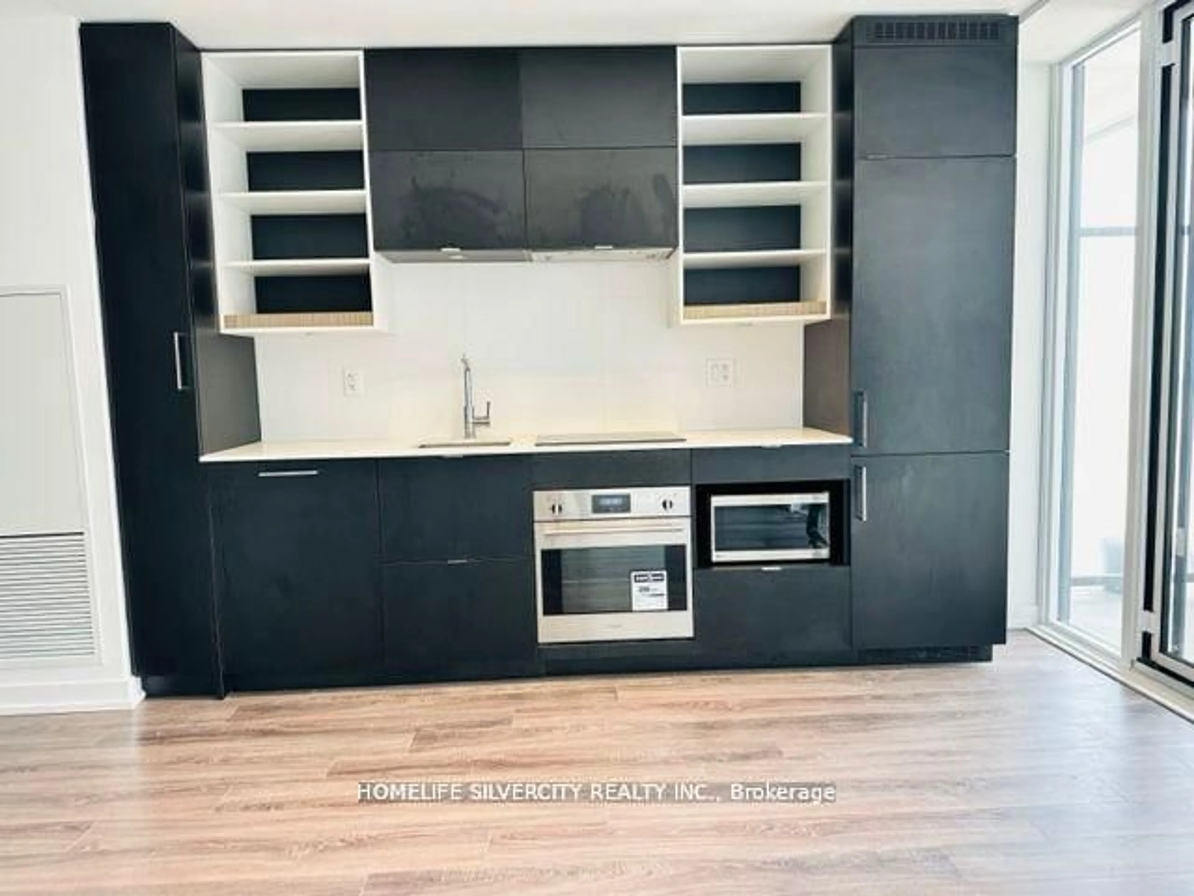 Open concept kitchen, wood/laminate floor for 20 Edward St #1318, Toronto Ontario M5G 1C9