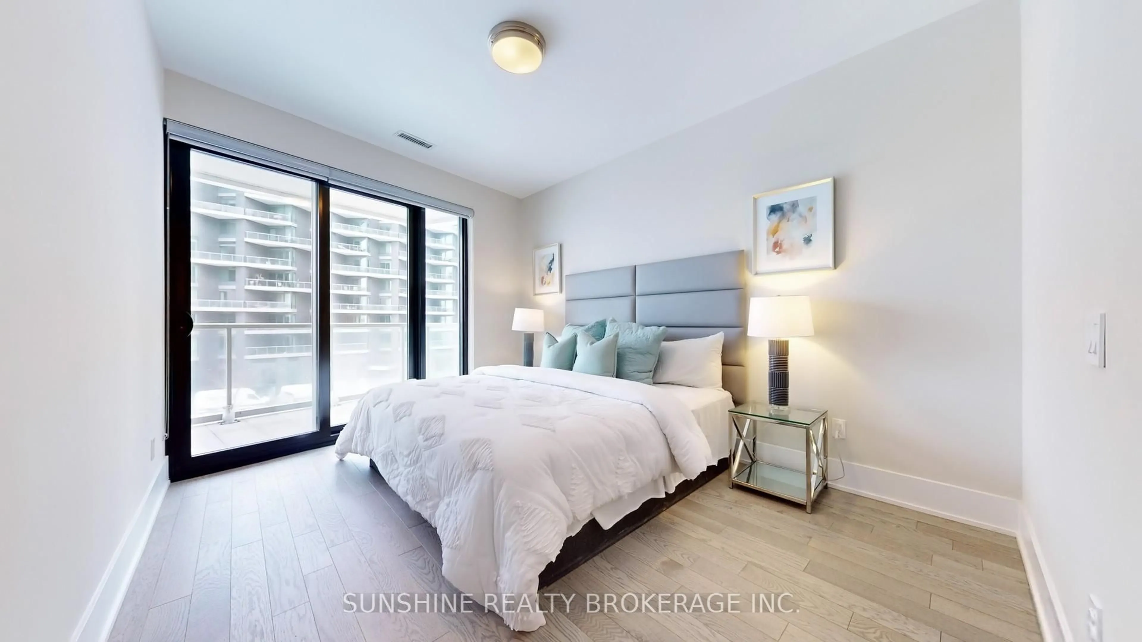 Bedroom with bed, unknown for 118 Merchants' Wharf #305, Toronto Ontario M5A 0L3