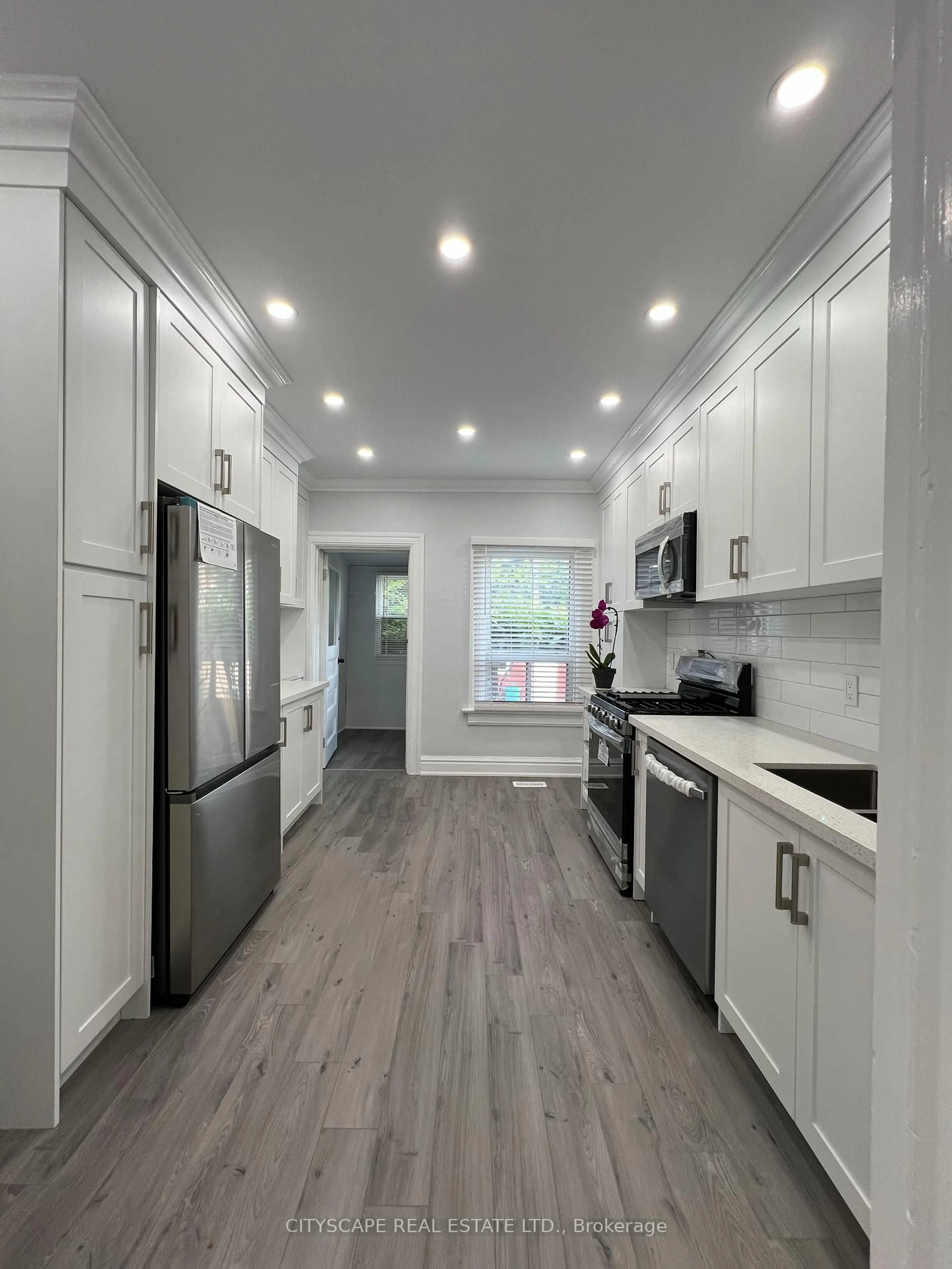 Open concept kitchen, unknown for 476 Lansdowne Ave, Toronto Ontario M6H 3Y3