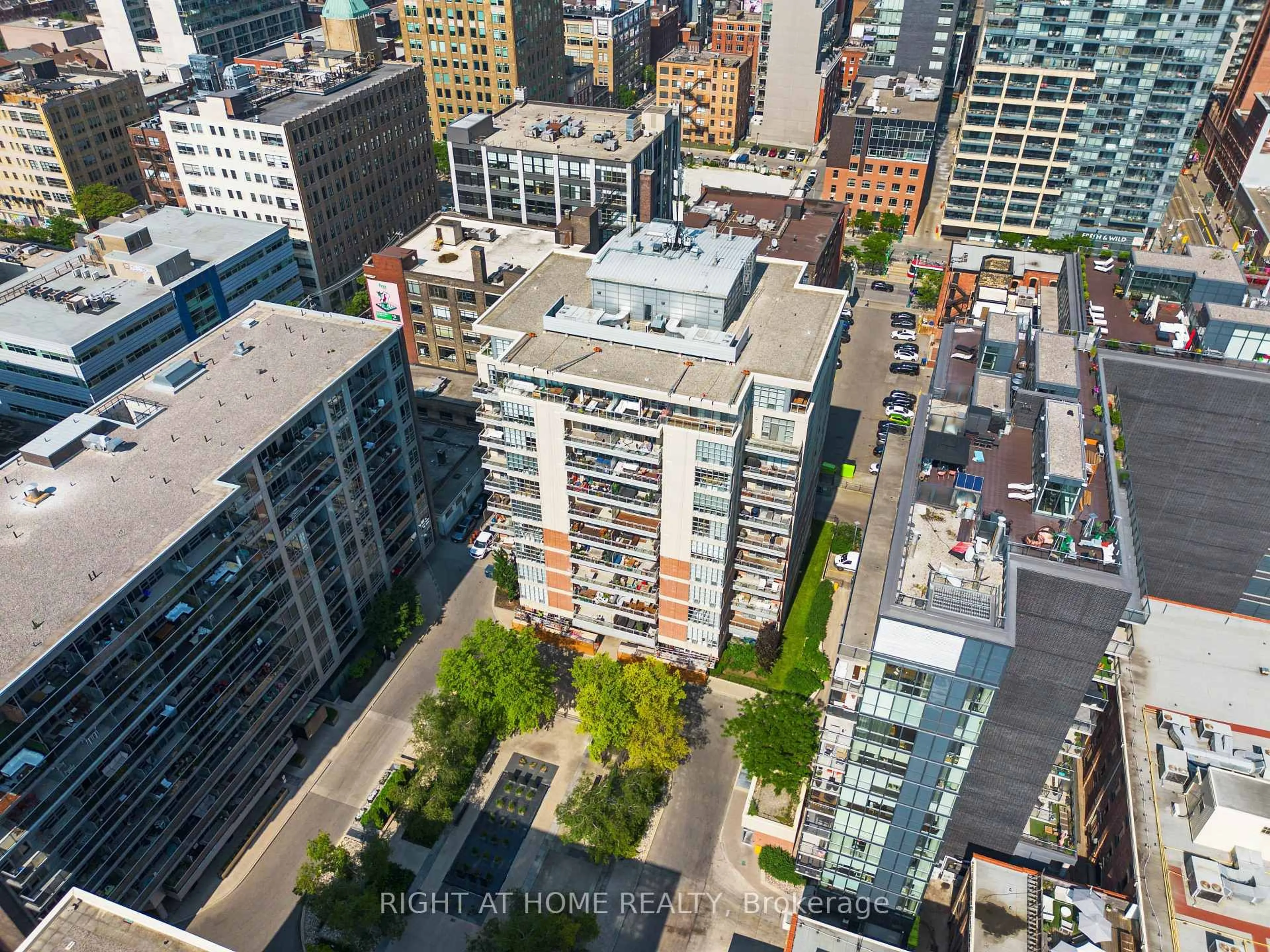 A pic from outside/outdoor area/front of a property/back of a property/a pic from drone, city buildings view from balcony for 23 Brant S St #209, Toronto Ontario M5V 2L5