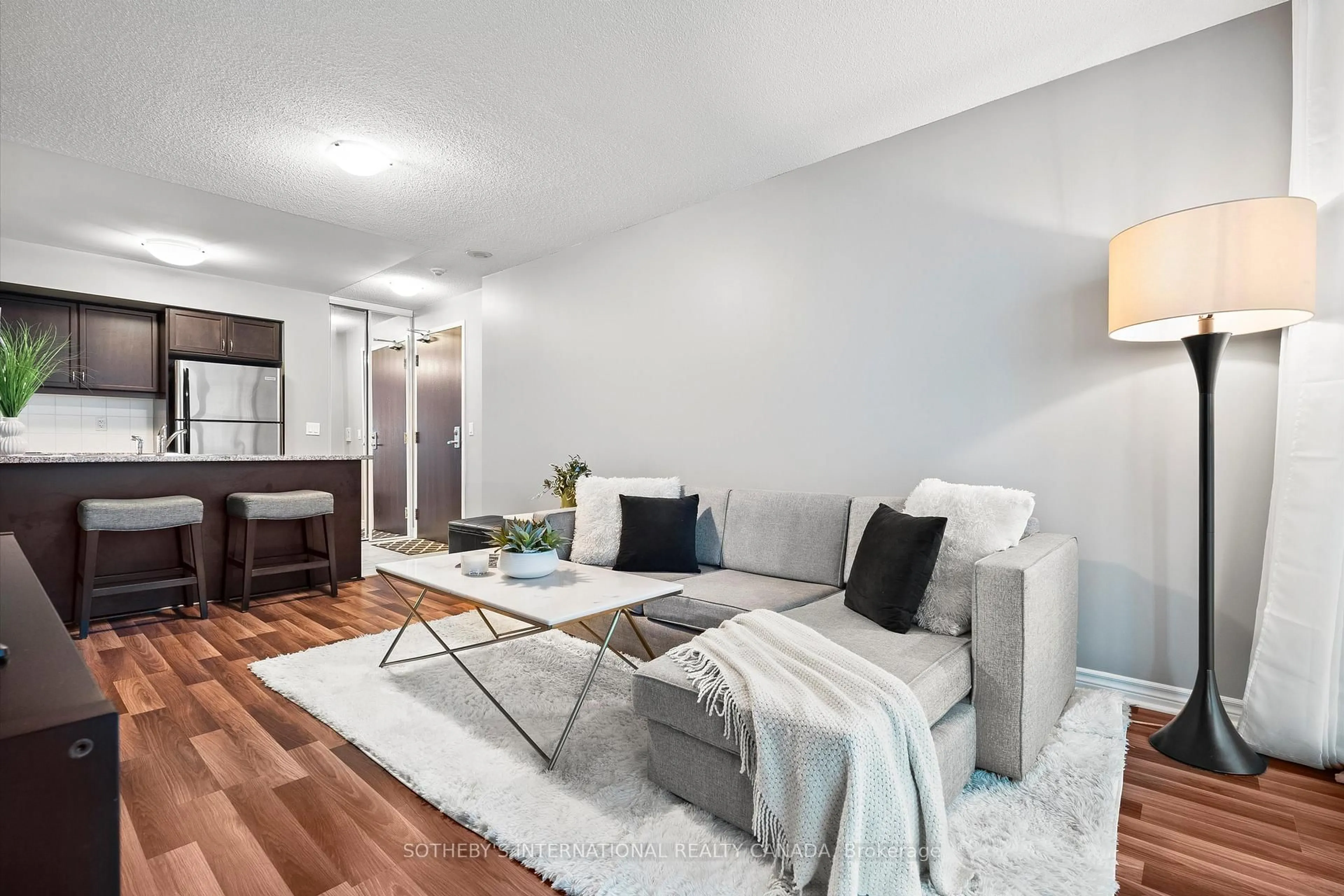 Living room with furniture, unknown for 19 Grand Trunk Cres #707, Toronto Ontario M5J 3A3