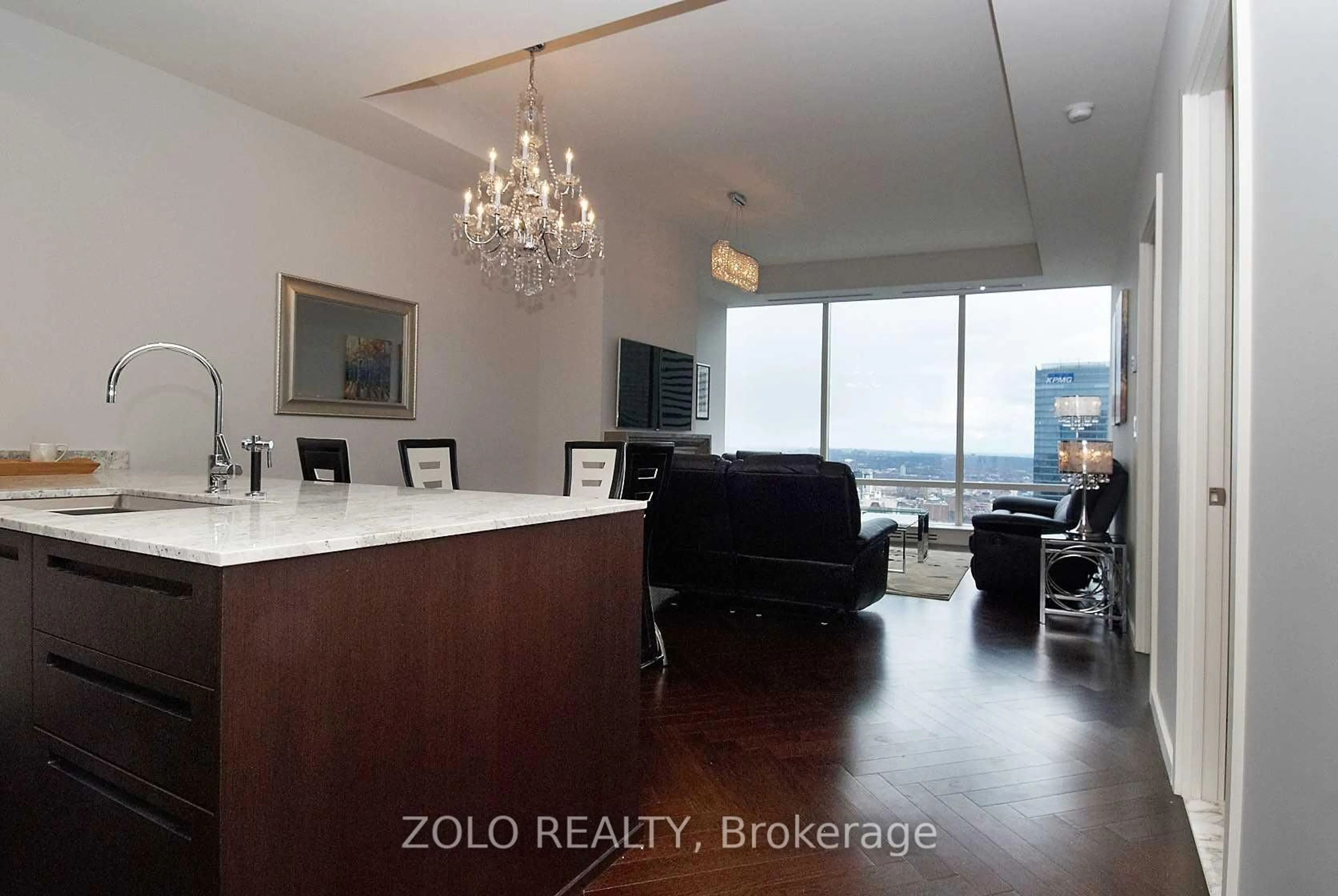 Living room with furniture, wood/laminate floor for 180 University Ave #5505, Toronto Ontario M5H 0A2