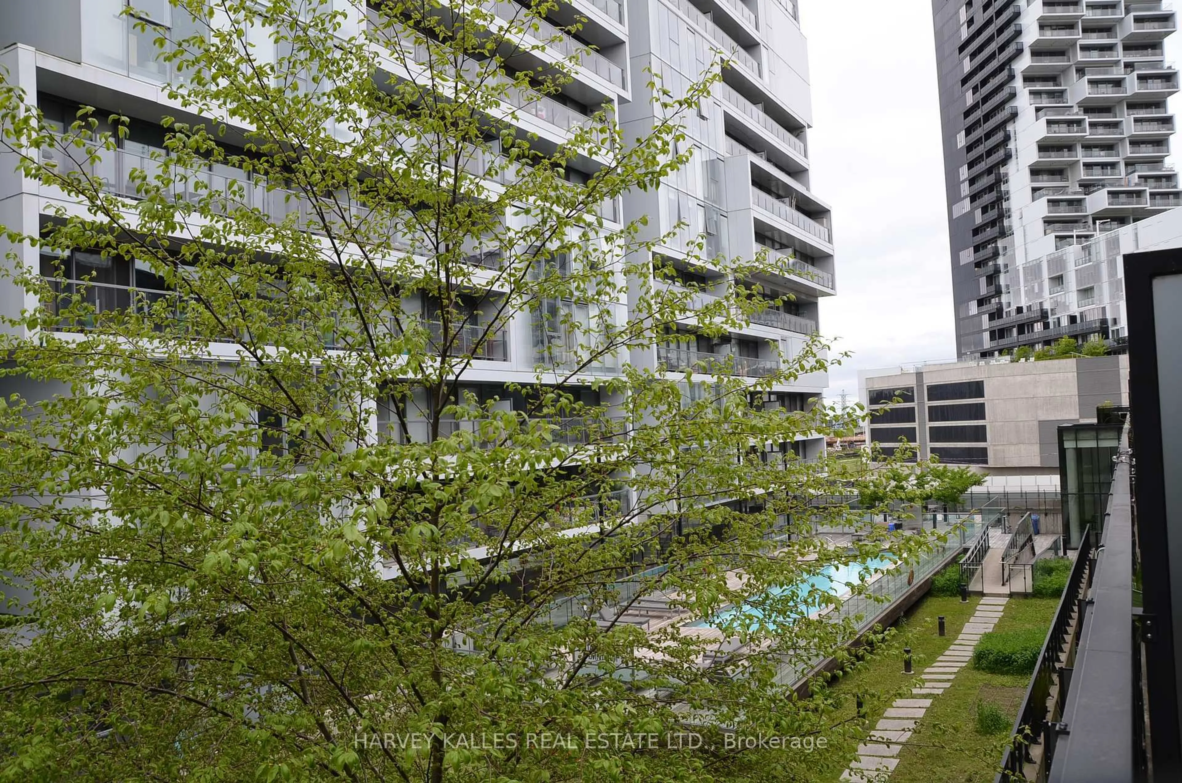 Patio, city buildings view from balcony for 47 Lower River St #526, Toronto Ontario M5A 0G1