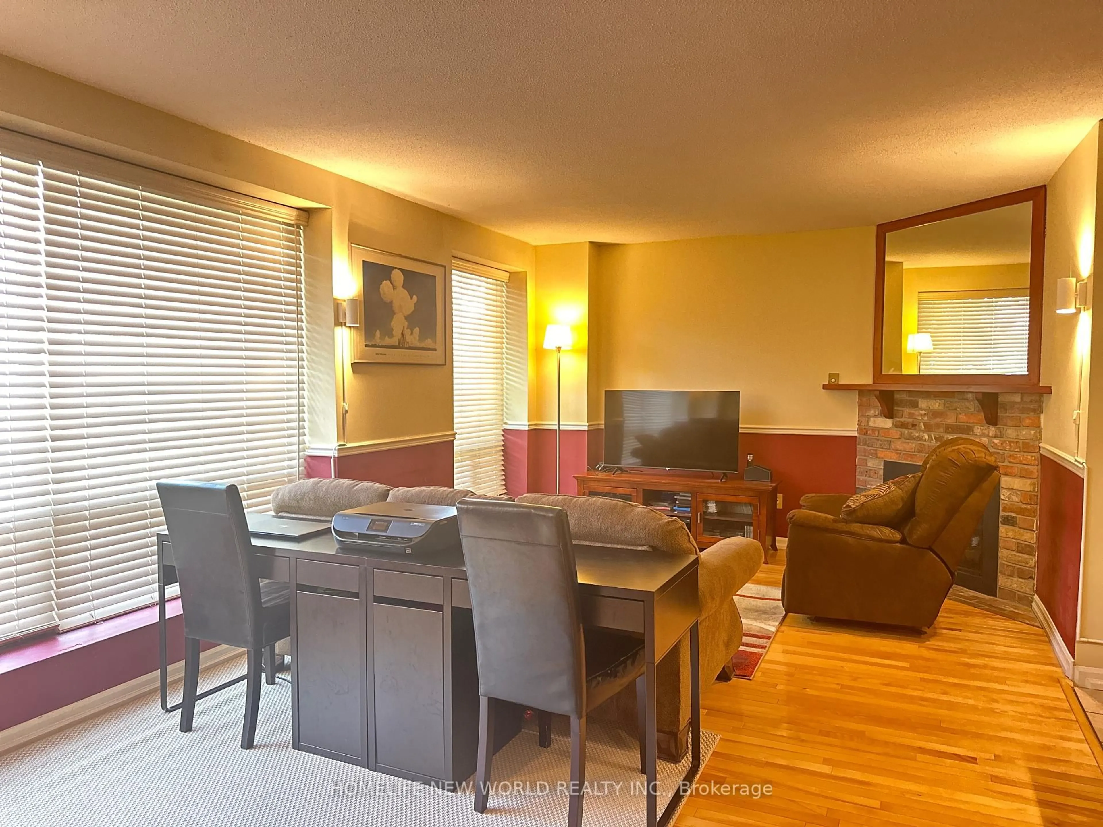 Living room with furniture, wood/laminate floor for 69 Upper Canada Dr #7, Toronto Ontario M2P 2A2