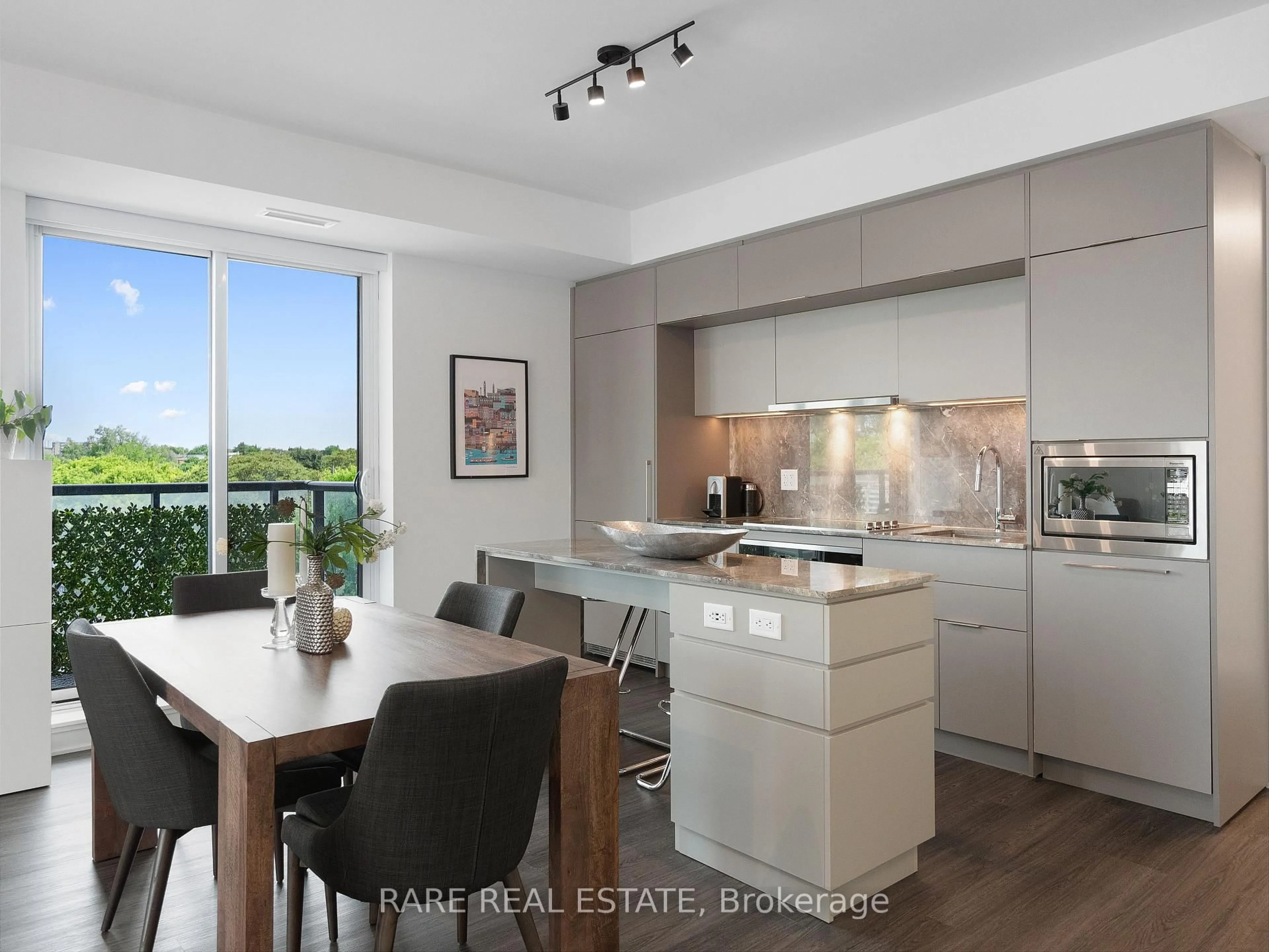 Open concept kitchen, wood/laminate floor for 185 Alberta Ave #601, Toronto Ontario M6C 0A5