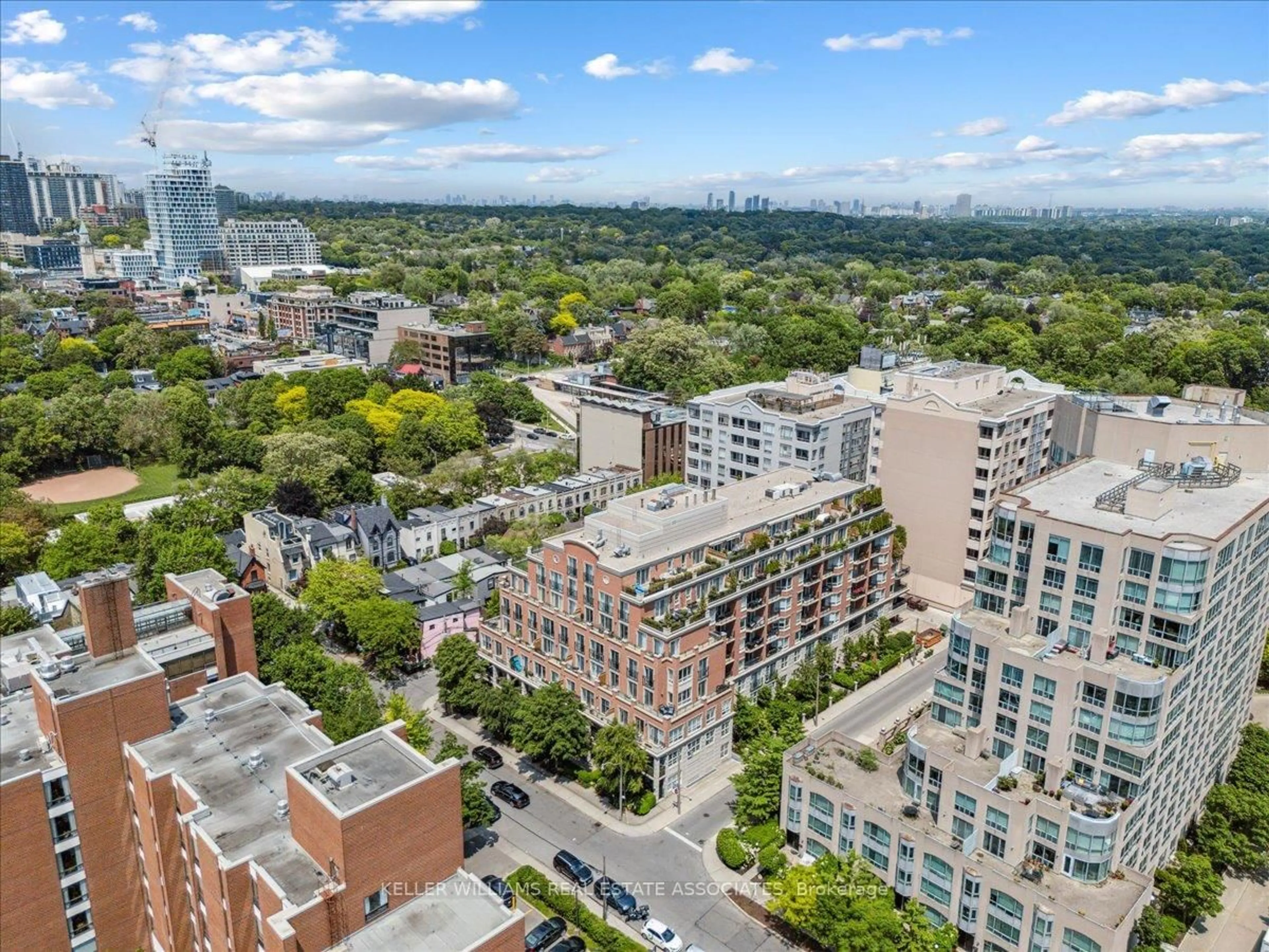 A pic from outside/outdoor area/front of a property/back of a property/a pic from drone, city buildings view from balcony for 77 McMurrich St #502, Toronto Ontario M5R 3V3