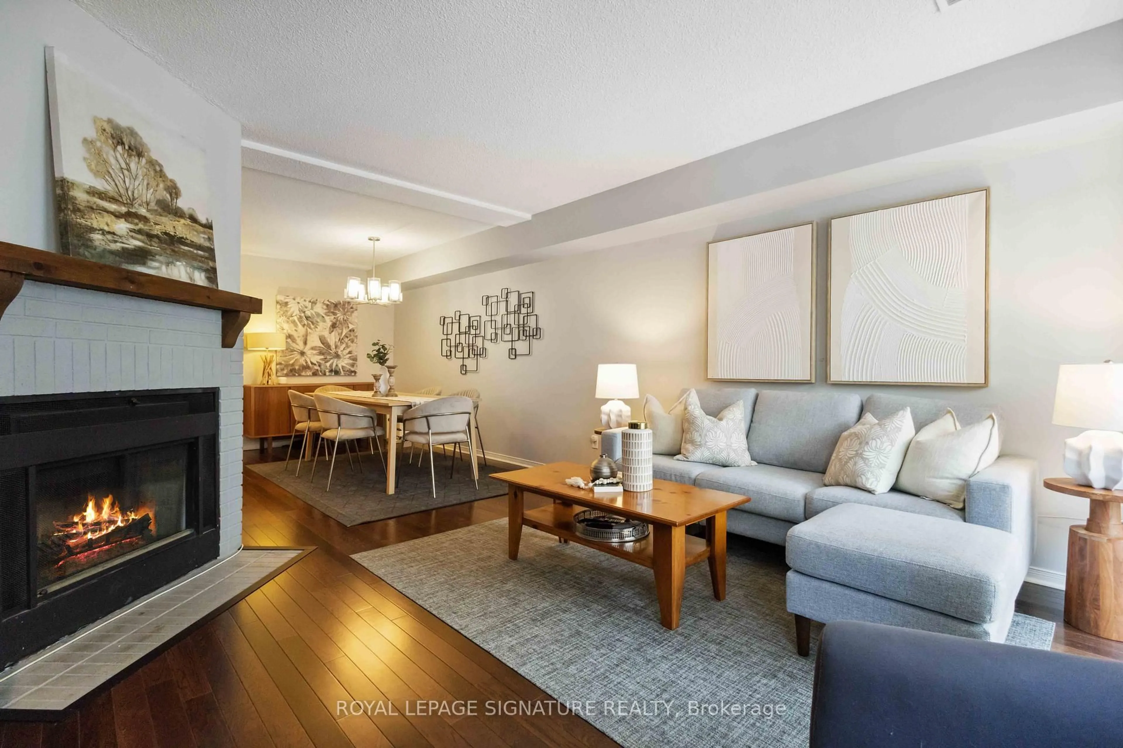 Living room with furniture, wood/laminate floor for 36B Massey St, Toronto Ontario M6J 3T7