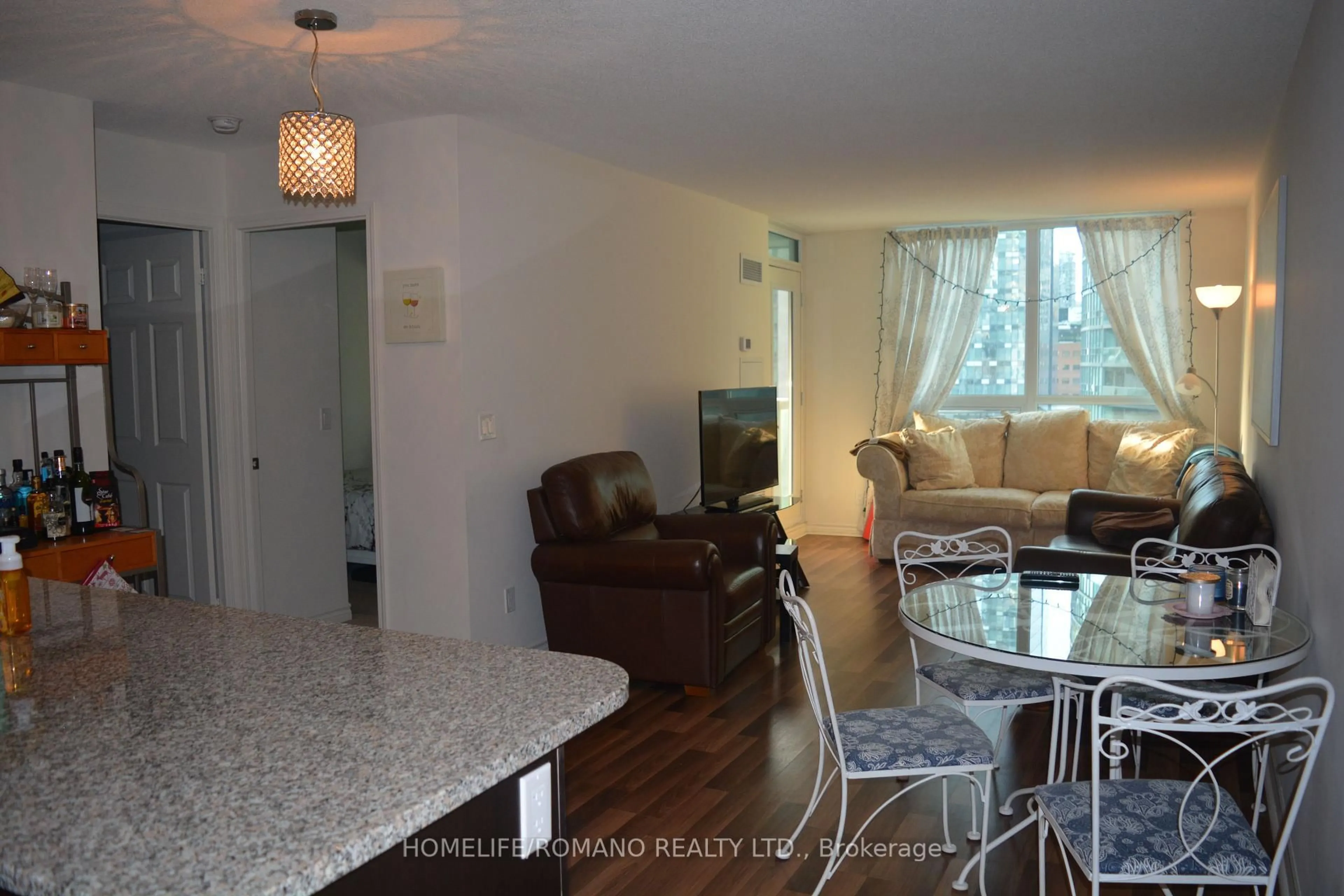 Living room with furniture, wood/laminate floor for 19 Grand Trunk Cres #1202, Toronto Ontario M5J 3A3