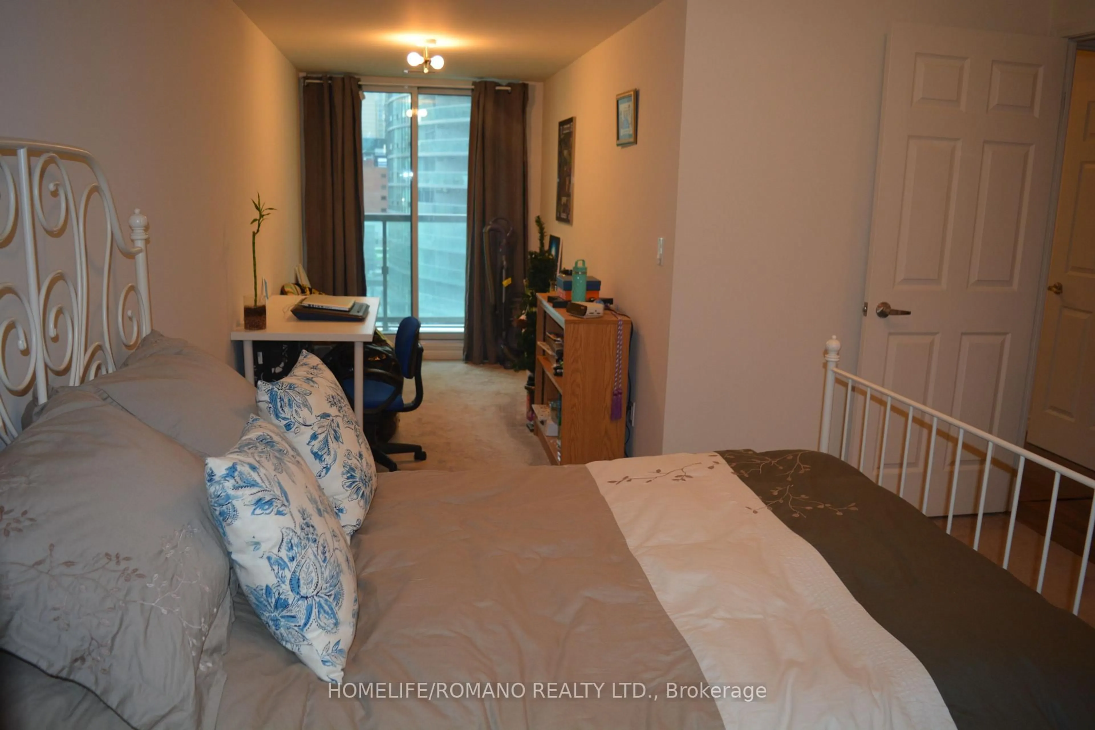Bedroom with bed, unknown for 19 Grand Trunk Cres #1202, Toronto Ontario M5J 3A3