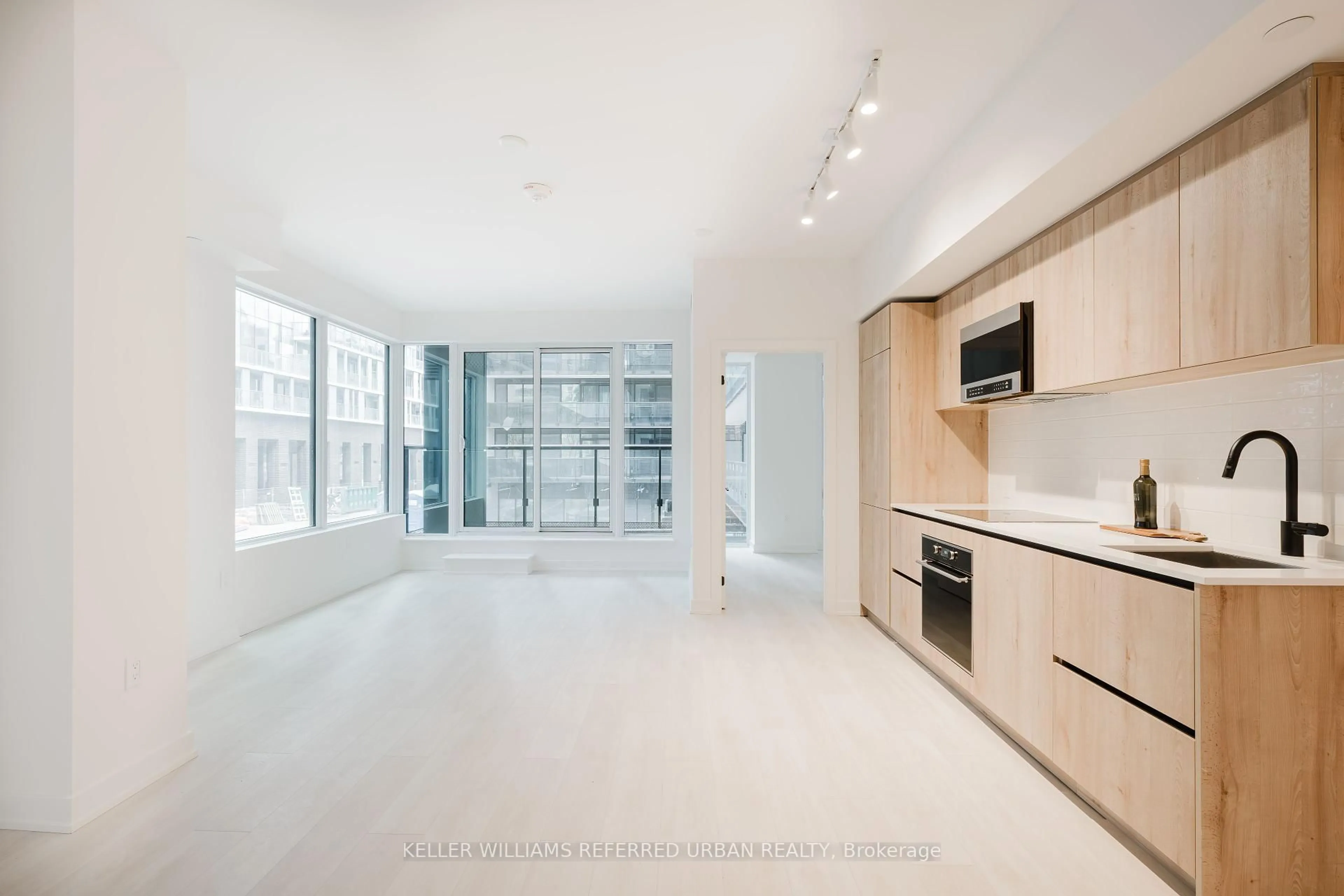 Open concept kitchen, unknown for 127 Broadway Ave #207, Toronto Ontario M4P 1V4