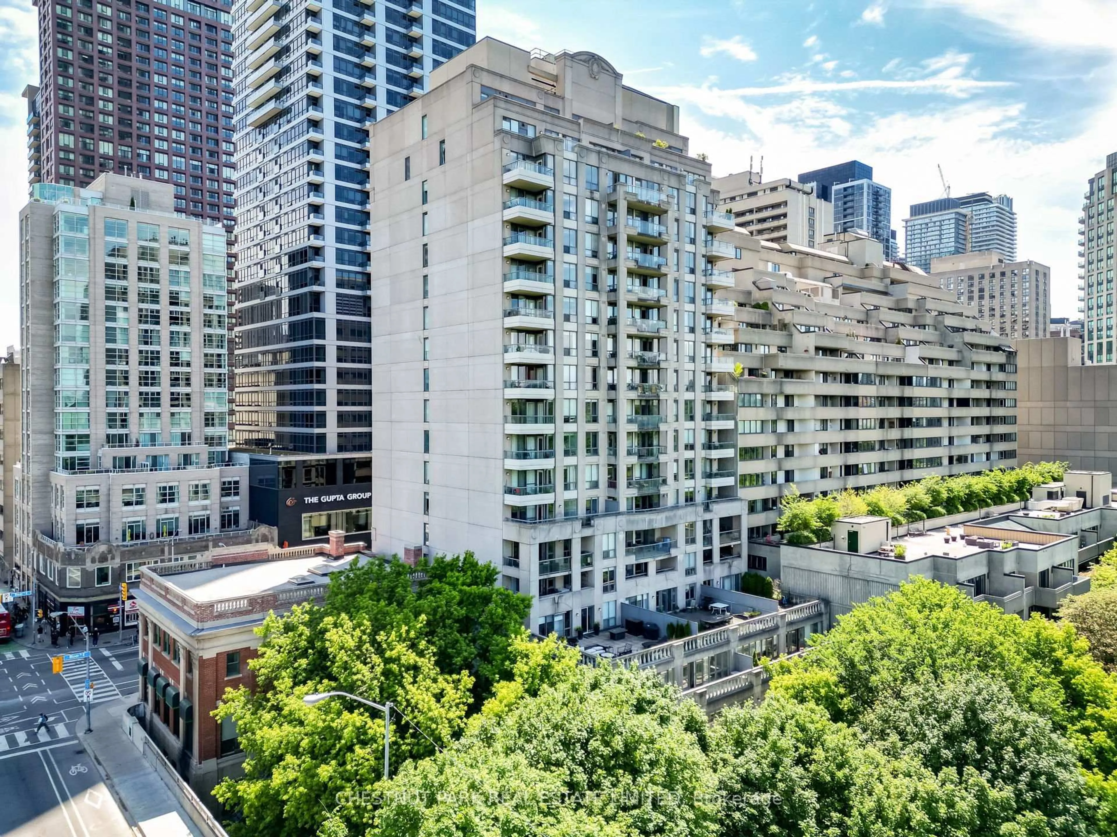 A pic from outside/outdoor area/front of a property/back of a property/a pic from drone, city buildings view from balcony for 388 Bloor St #703, Toronto Ontario M4W 3W9