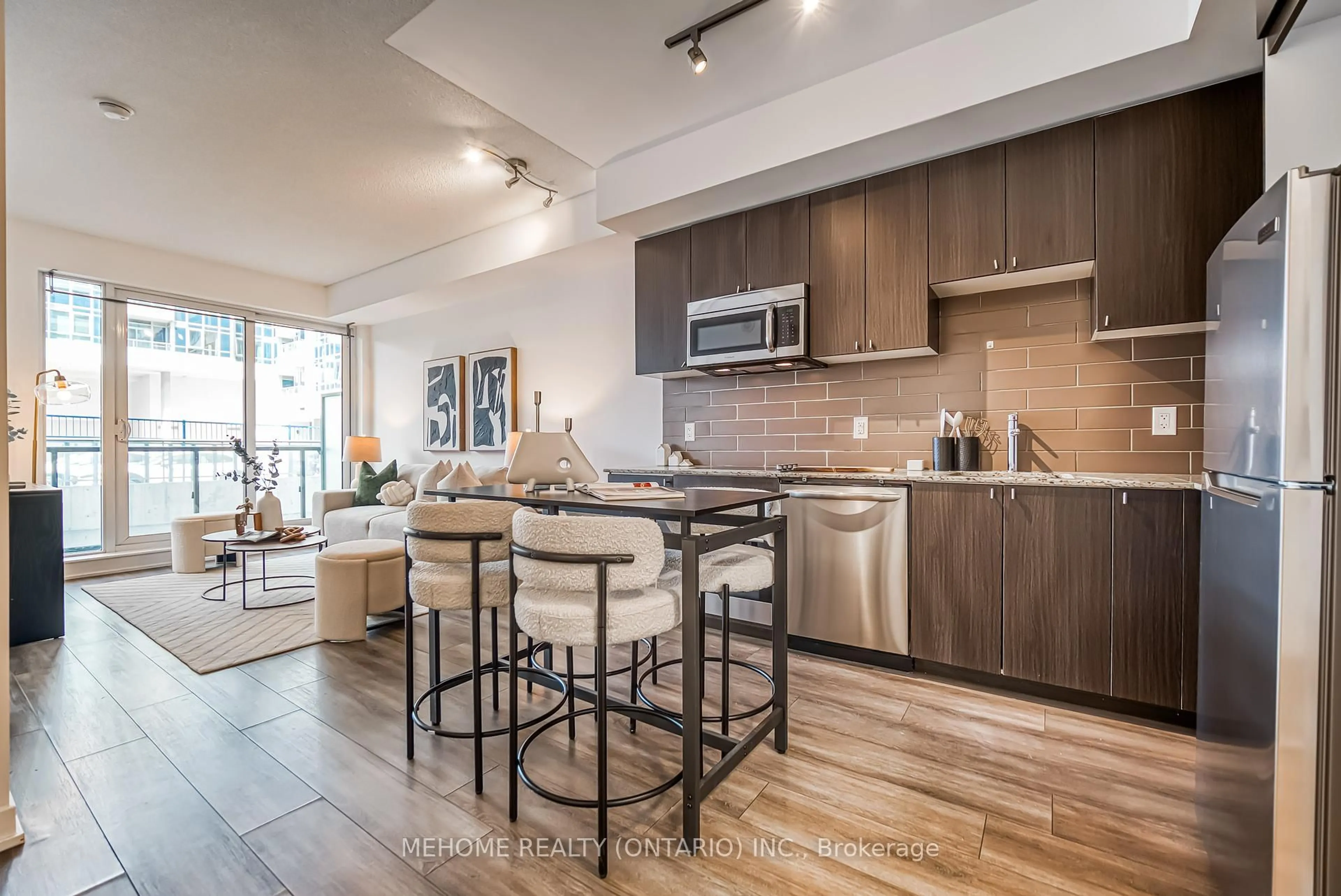 Open concept kitchen, wood/laminate floor for 18 Rean Dr #202, Toronto Ontario M2K 0C7