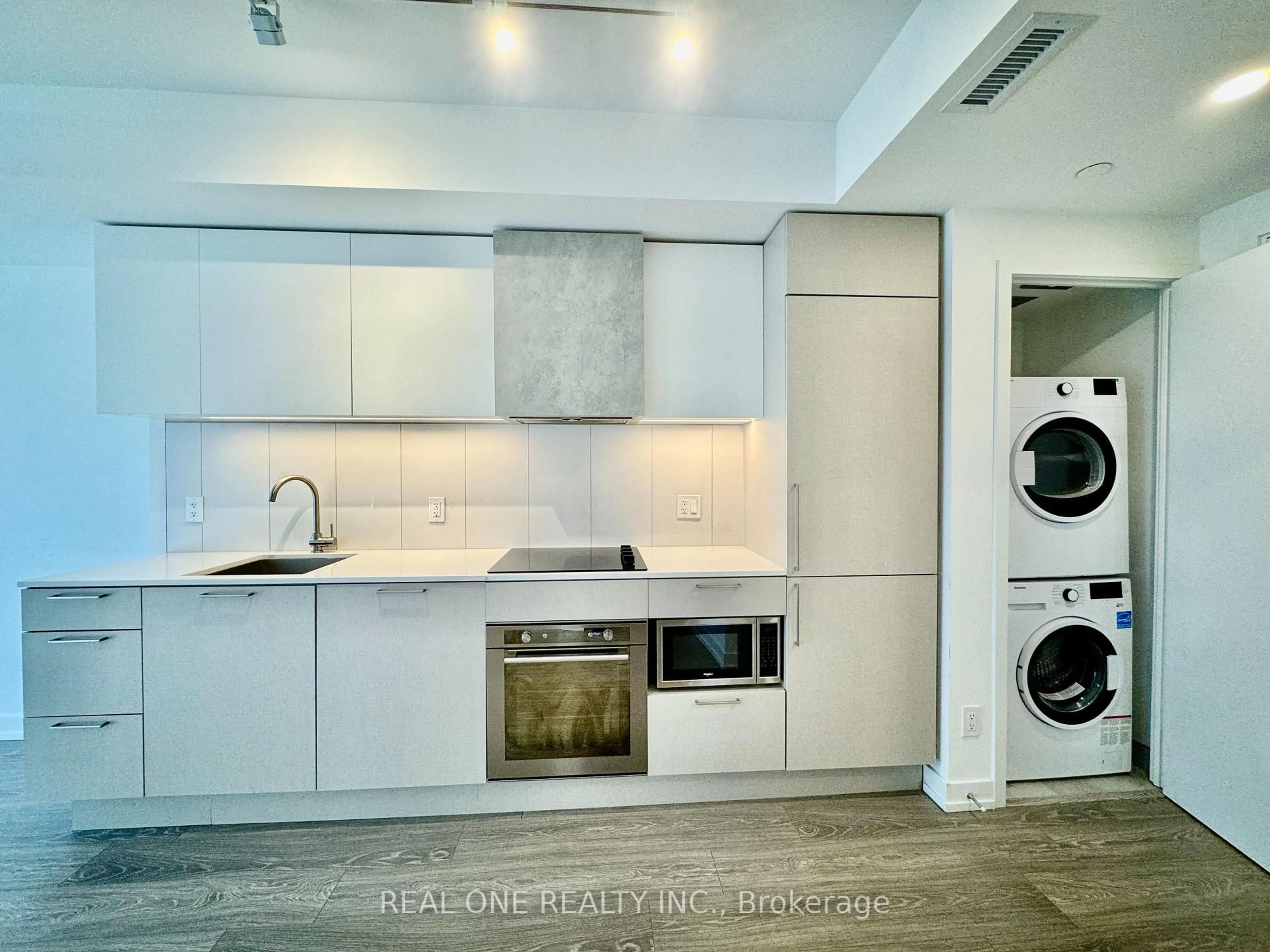 Kitchen with laundary machines, unknown for 19 Western Battery Rd #Ph03, Toronto Ontario M6K 0E3