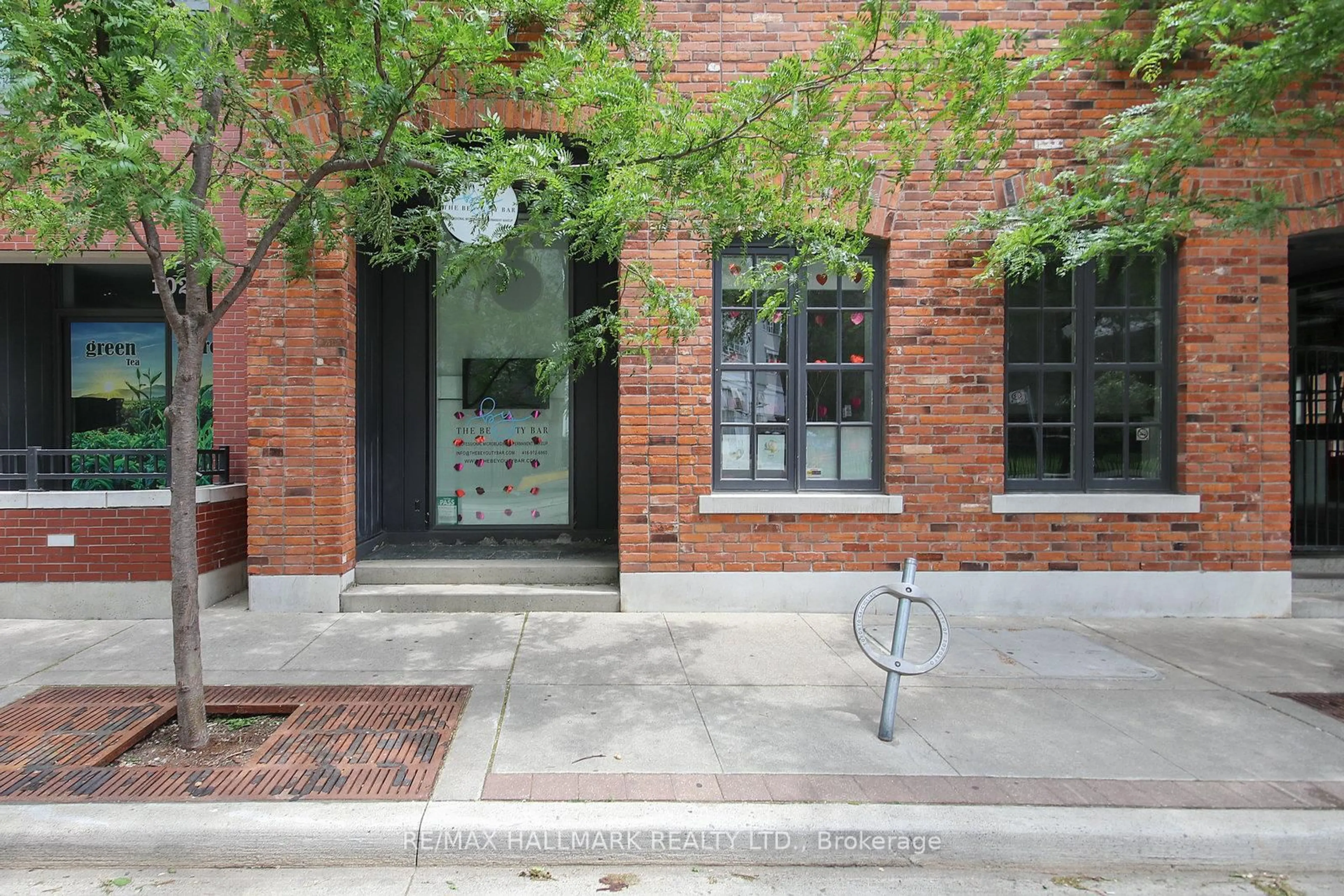 Home with brick exterior material, street for 75 St Nicholas St #103, Toronto Ontario M4Y 0A5