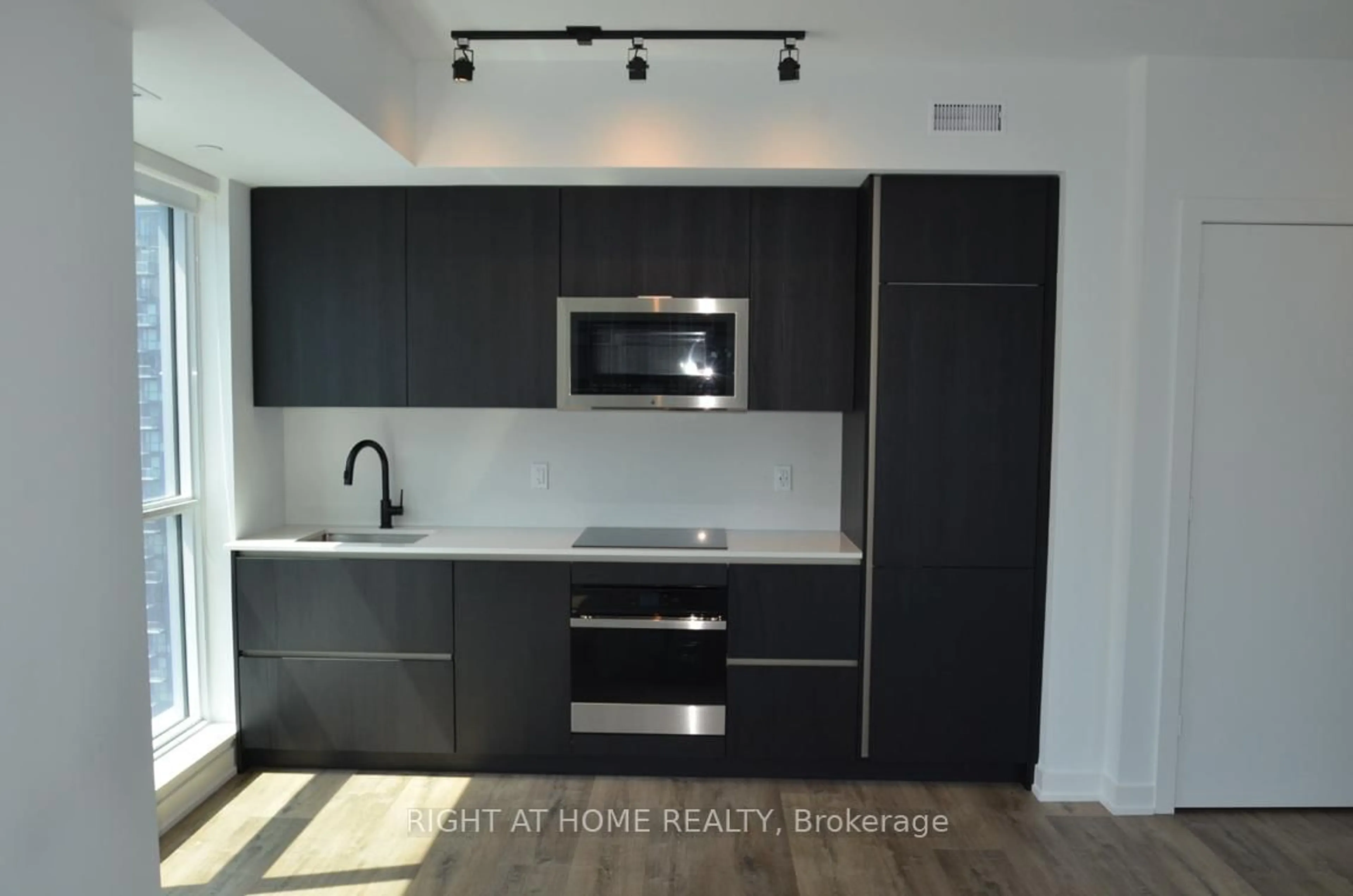 Open concept kitchen, unknown for 327 King St #4303, Toronto Ontario M5V 0W7