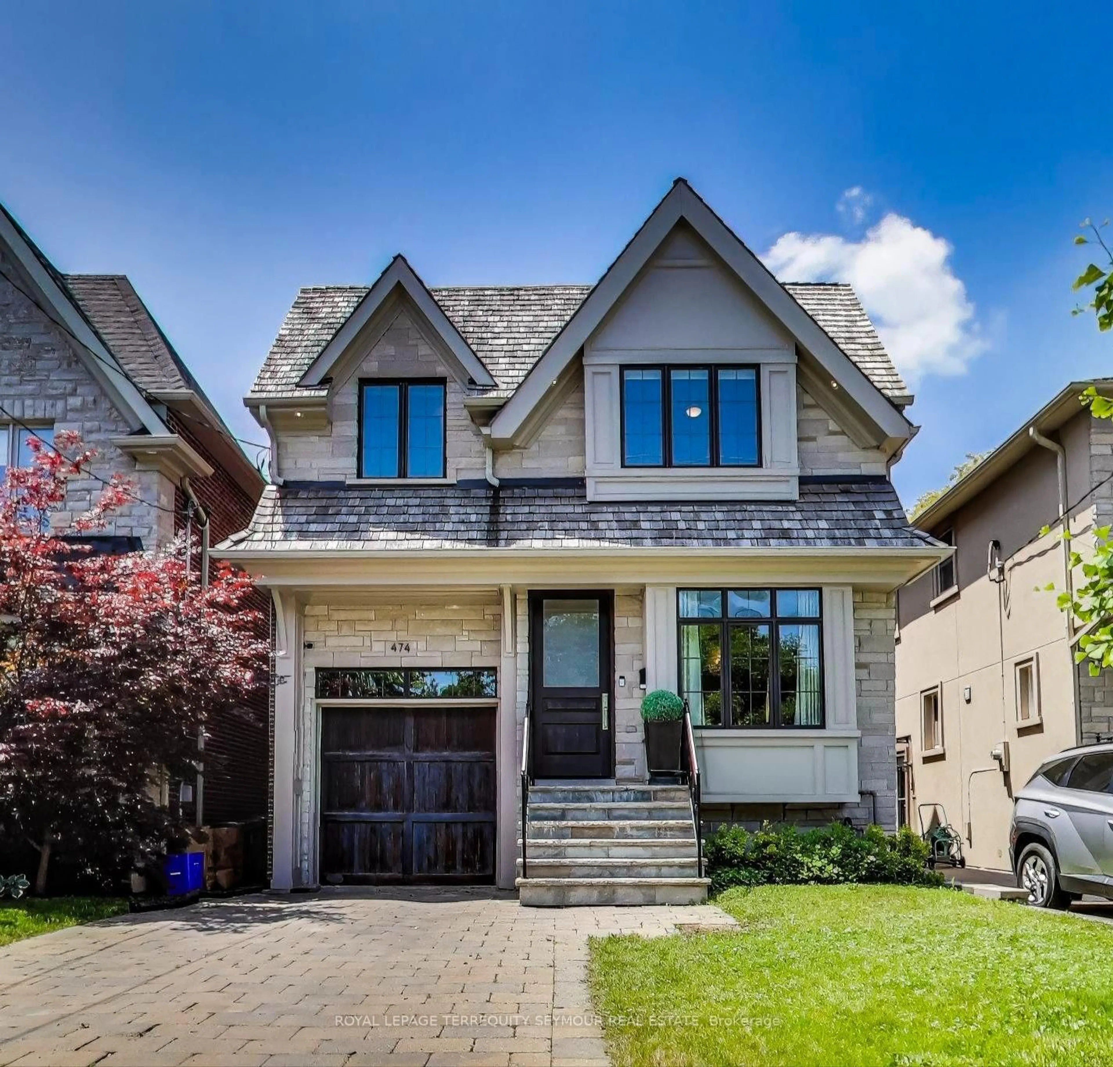Home with brick exterior material, street for 474 Sutherland Dr, Toronto Ontario M4G 1K8