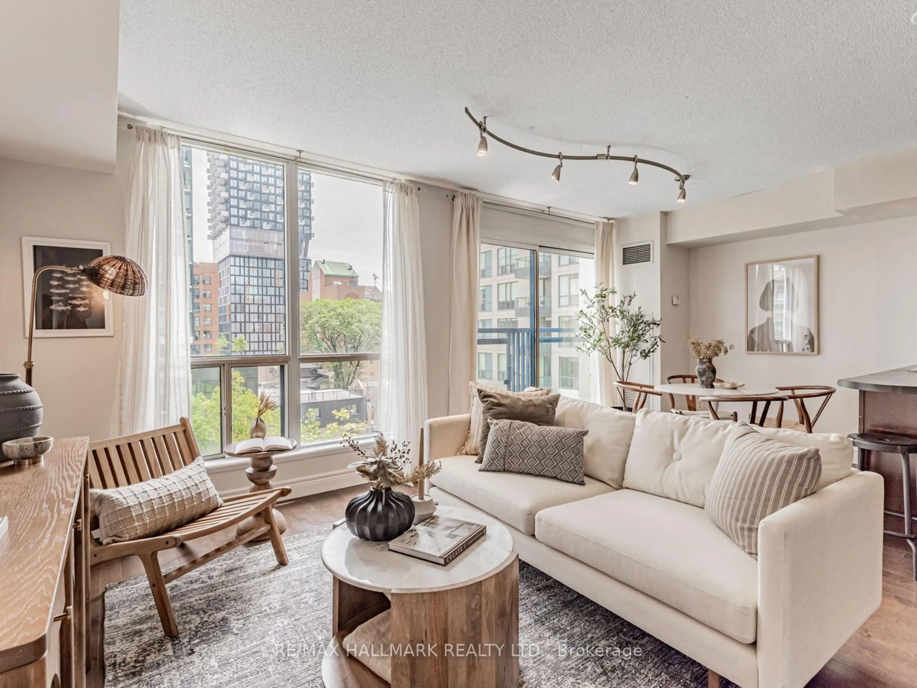 Living room with furniture, unknown for 75 Dalhousie St #710, Toronto Ontario M5B 2R9