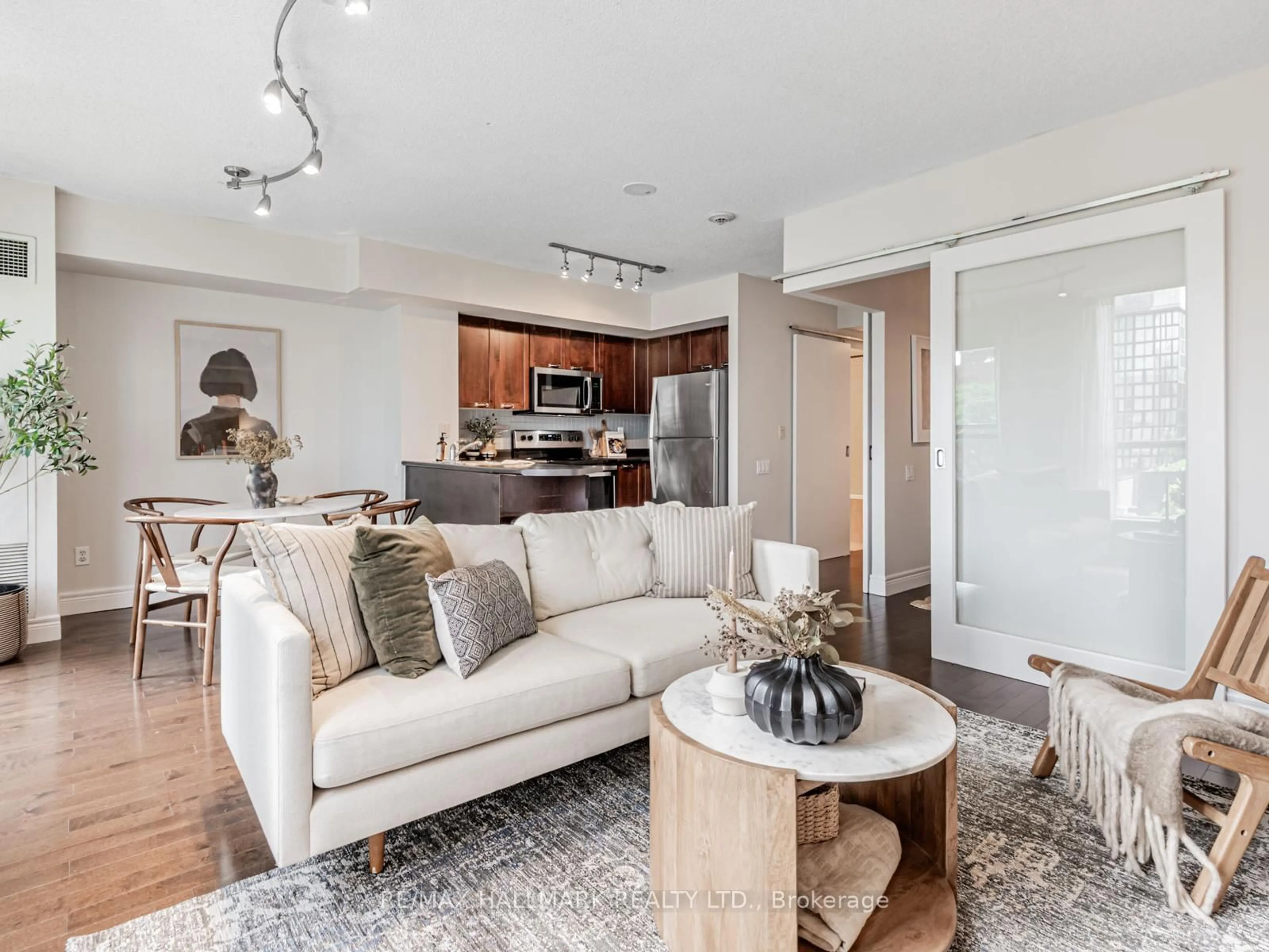 Living room with furniture, unknown for 75 Dalhousie St #710, Toronto Ontario M5B 2R9
