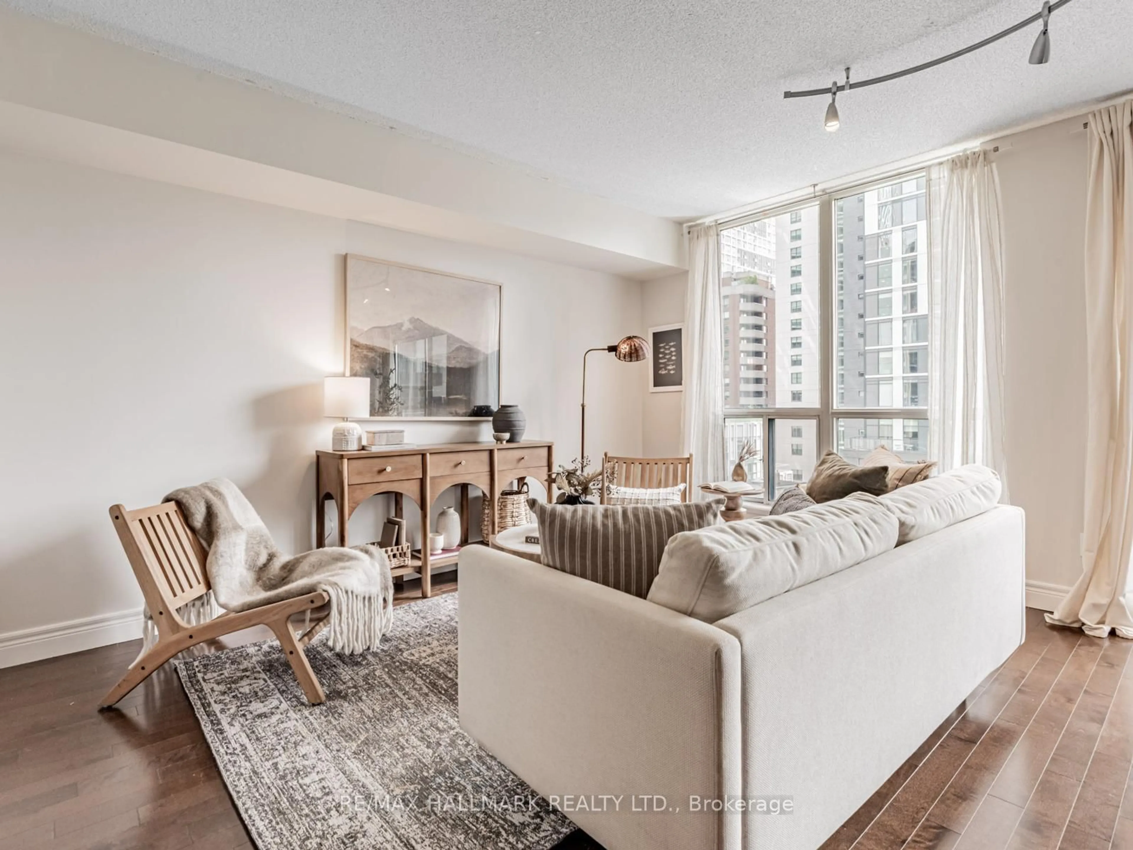 Living room with furniture, unknown for 75 Dalhousie St #710, Toronto Ontario M5B 2R9