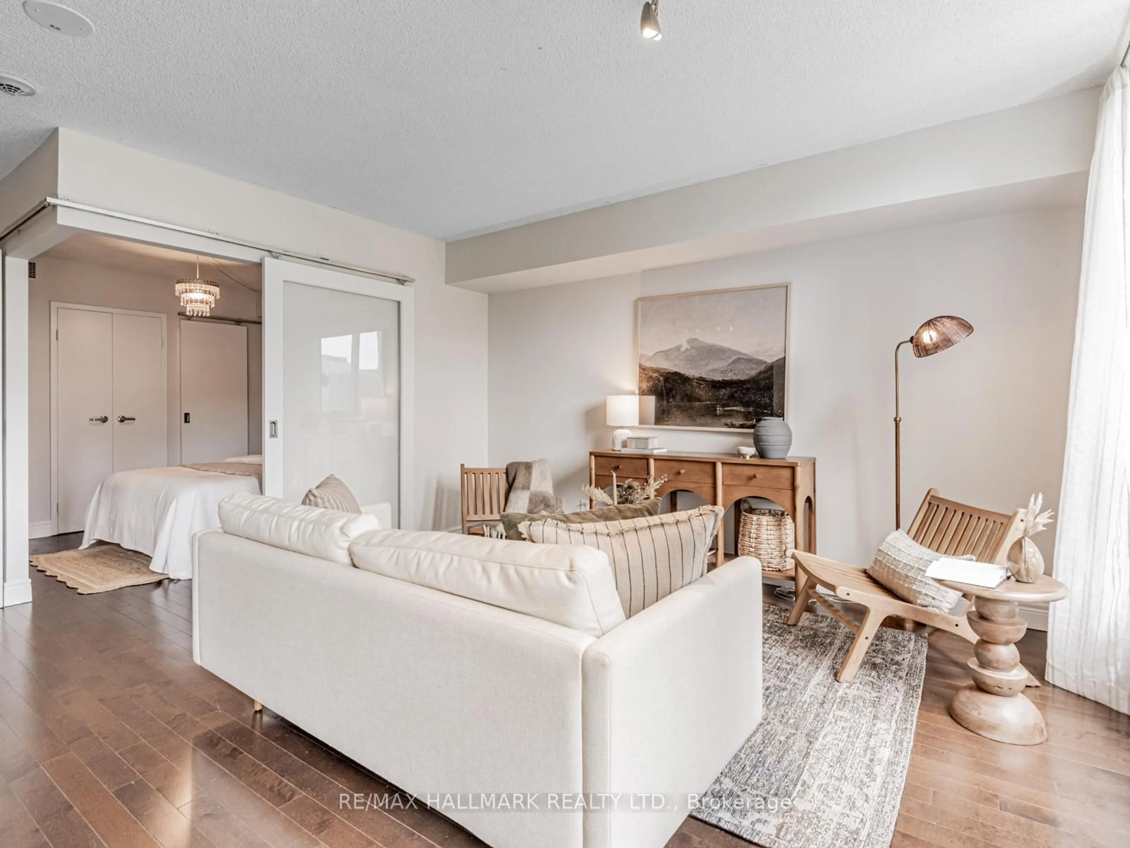 Living room with furniture, unknown for 75 Dalhousie St #710, Toronto Ontario M5B 2R9