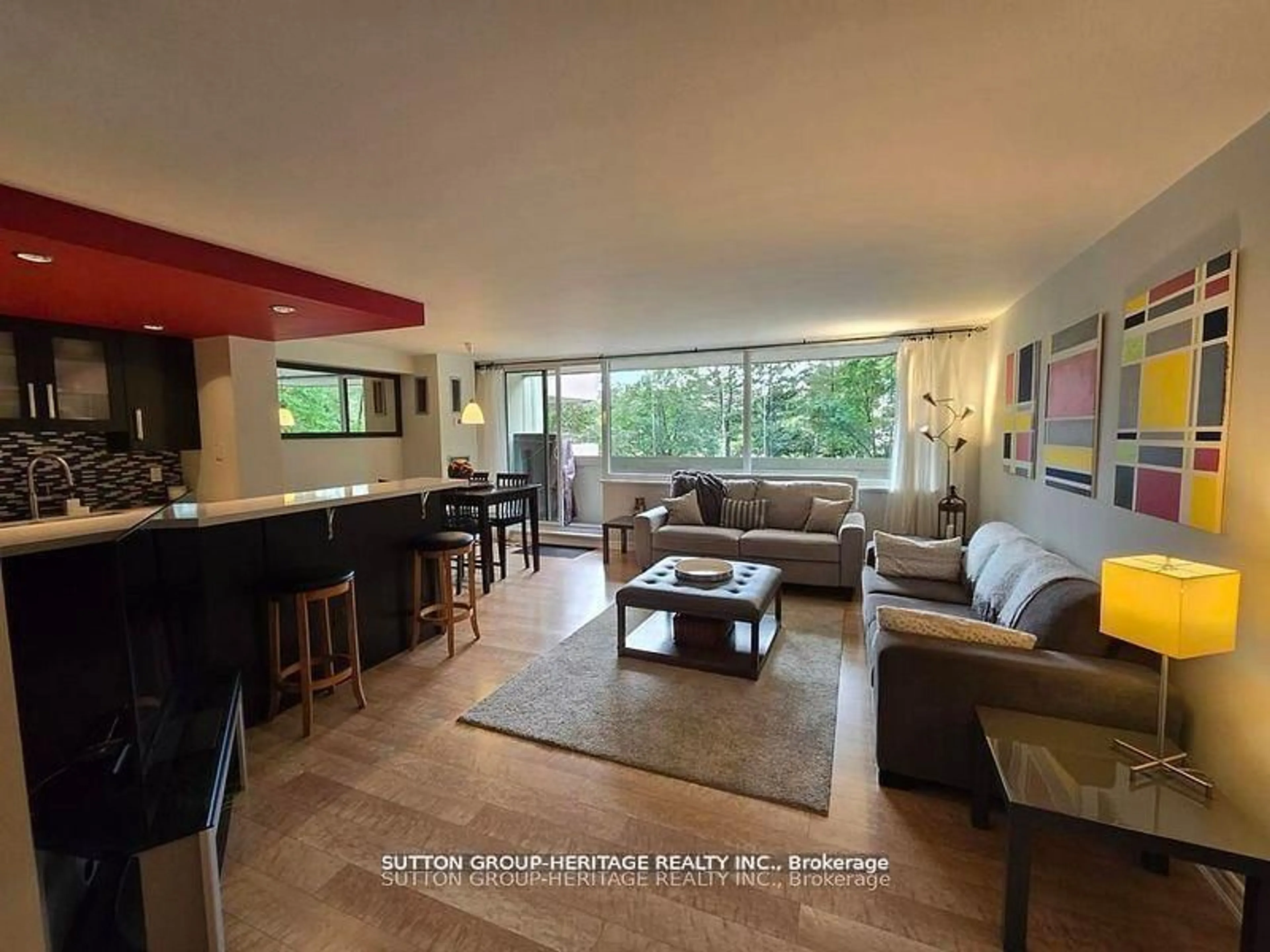 Living room with furniture, unknown for 75 Wynford Heights Cres #201, Toronto Ontario M3C 3H9