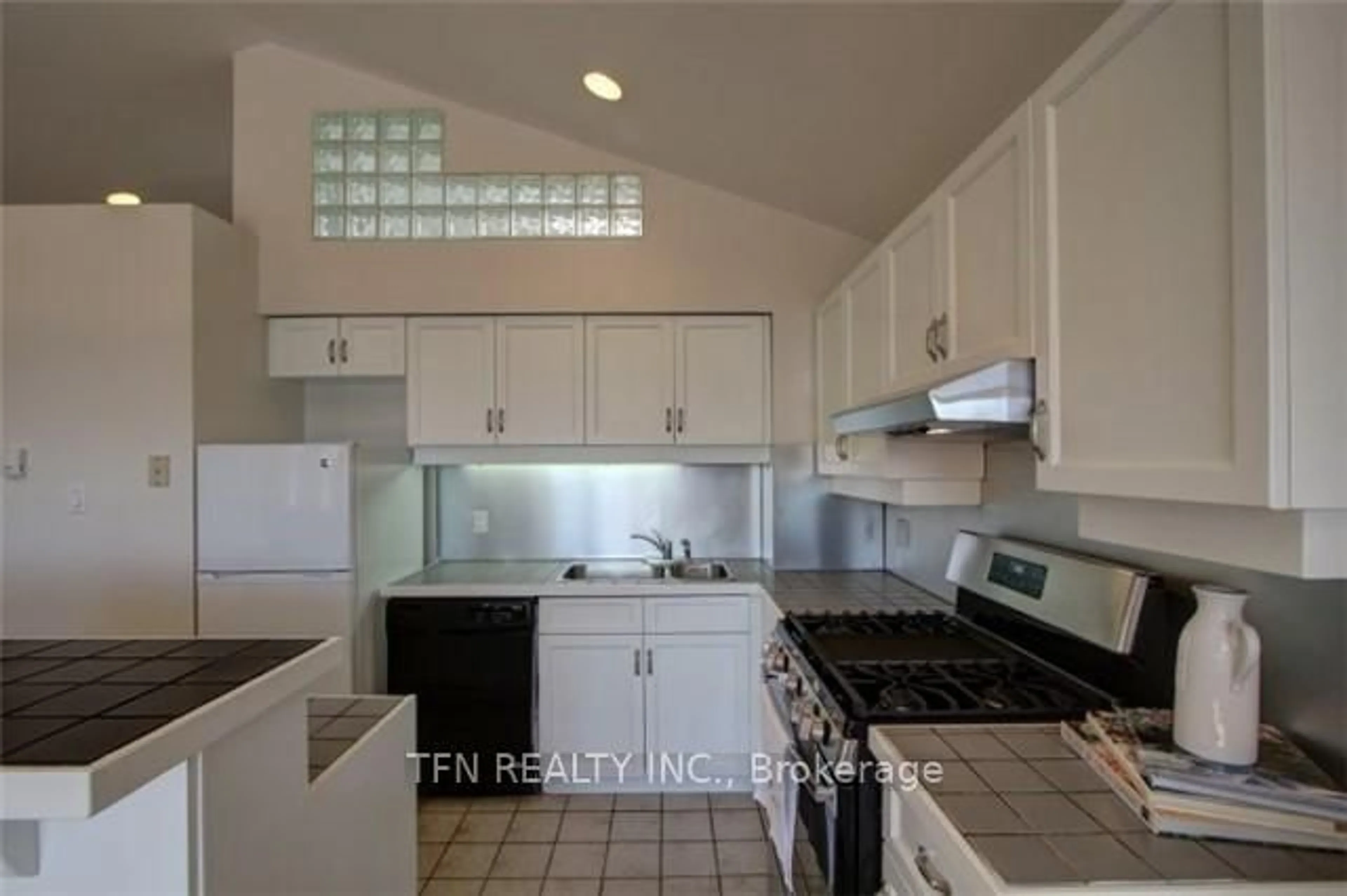 Standard kitchen, ceramic/tile floor for 447 Oakwood Ave, Toronto Ontario M6E 2W4