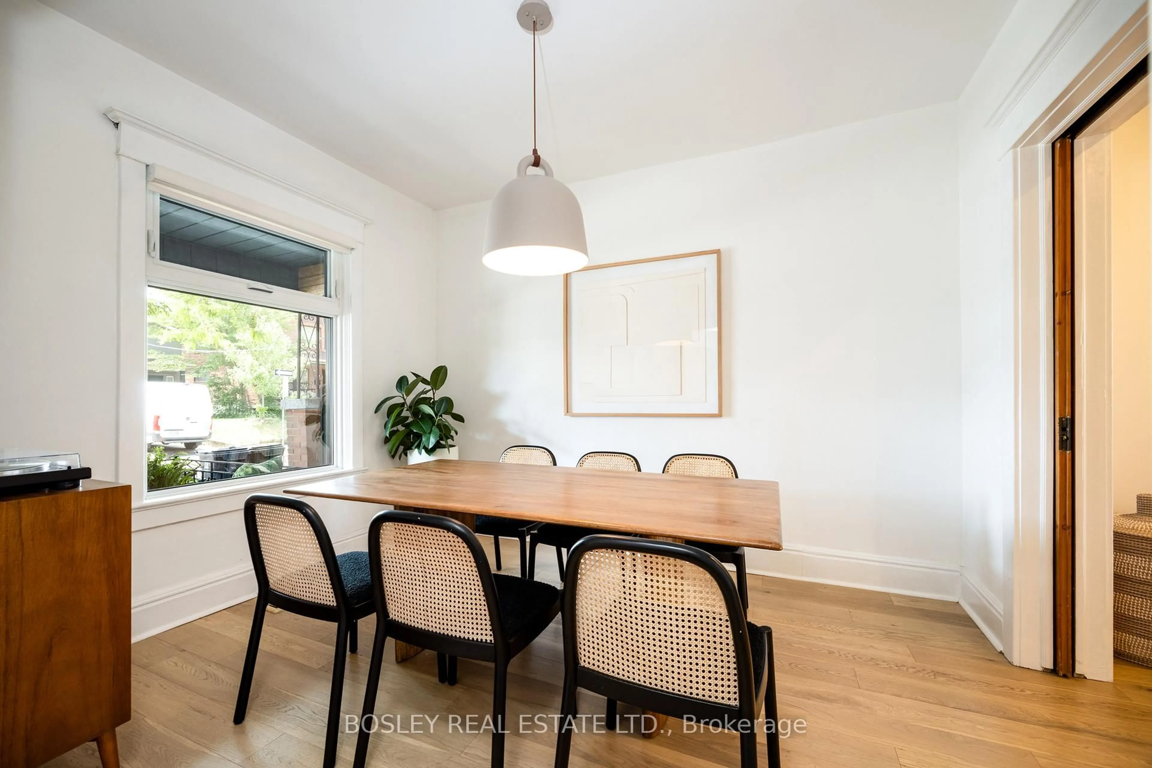 Dining room, wood/laminate floor for 12 Muir Ave, Toronto Ontario M6H 1E8