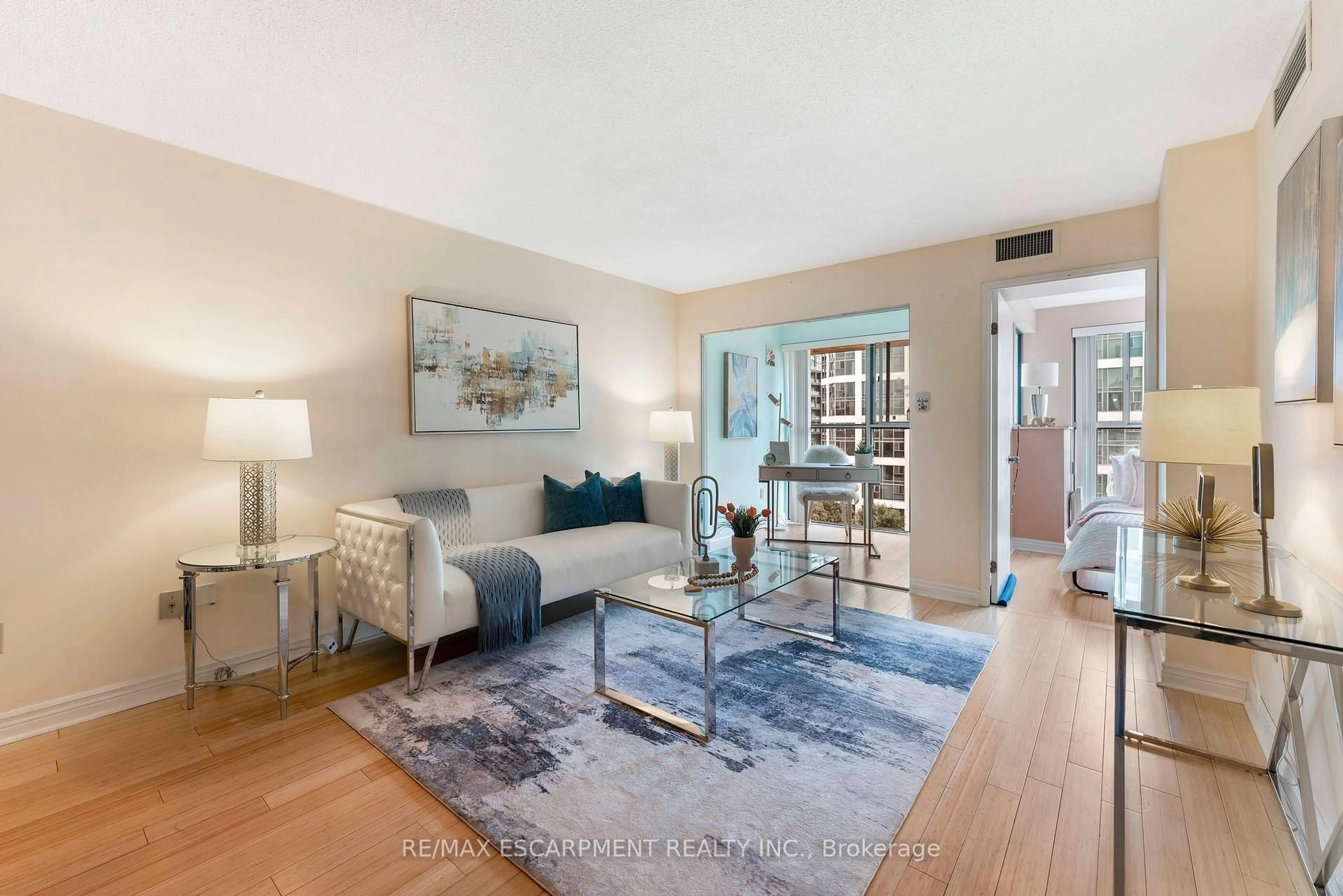 Living room with furniture, unknown for 65 Scadding Ave #811, Toronto Ontario M5A 4L1