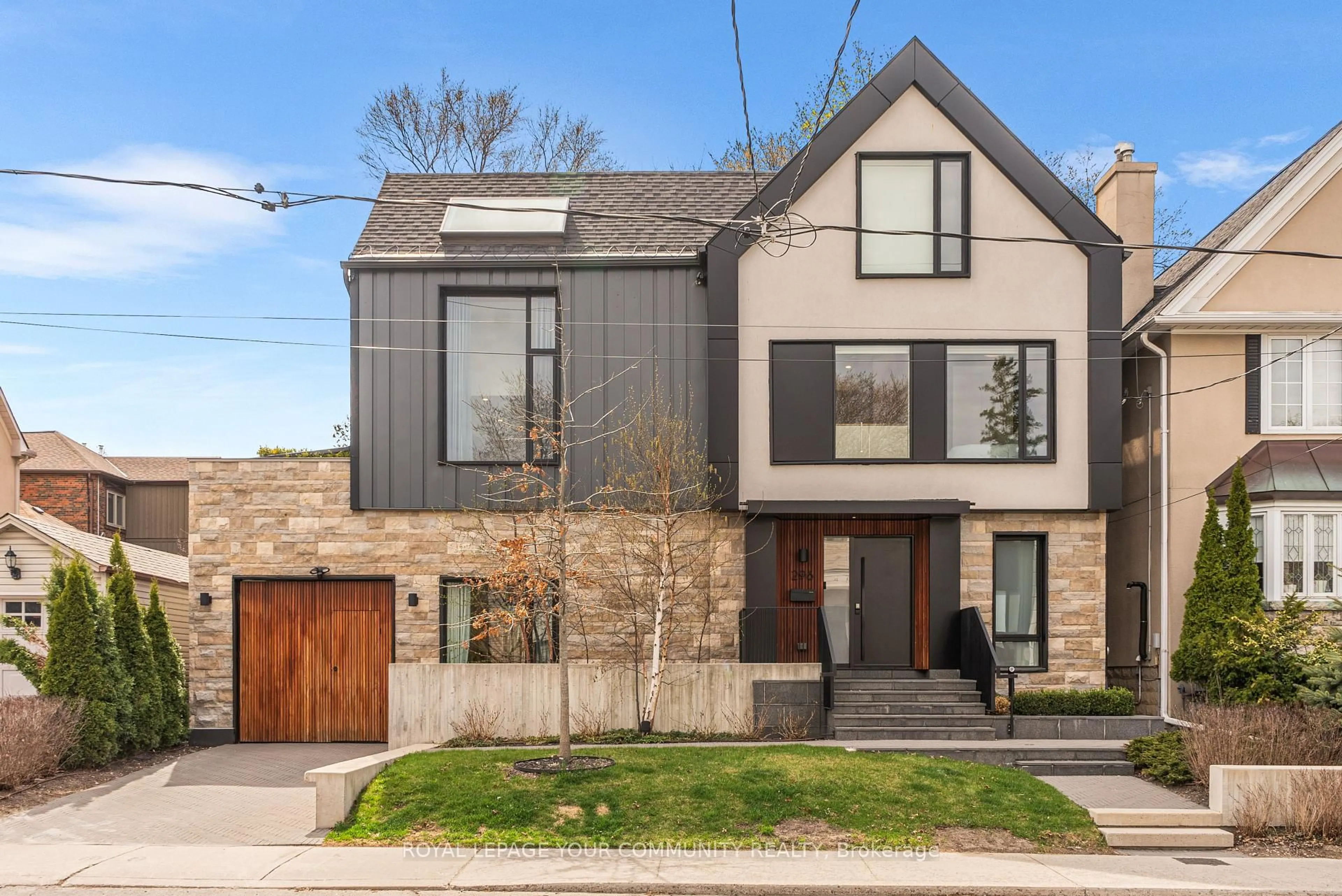 Home with brick exterior material, street for 296 Elm Rd, Toronto Ontario M5M 3V2