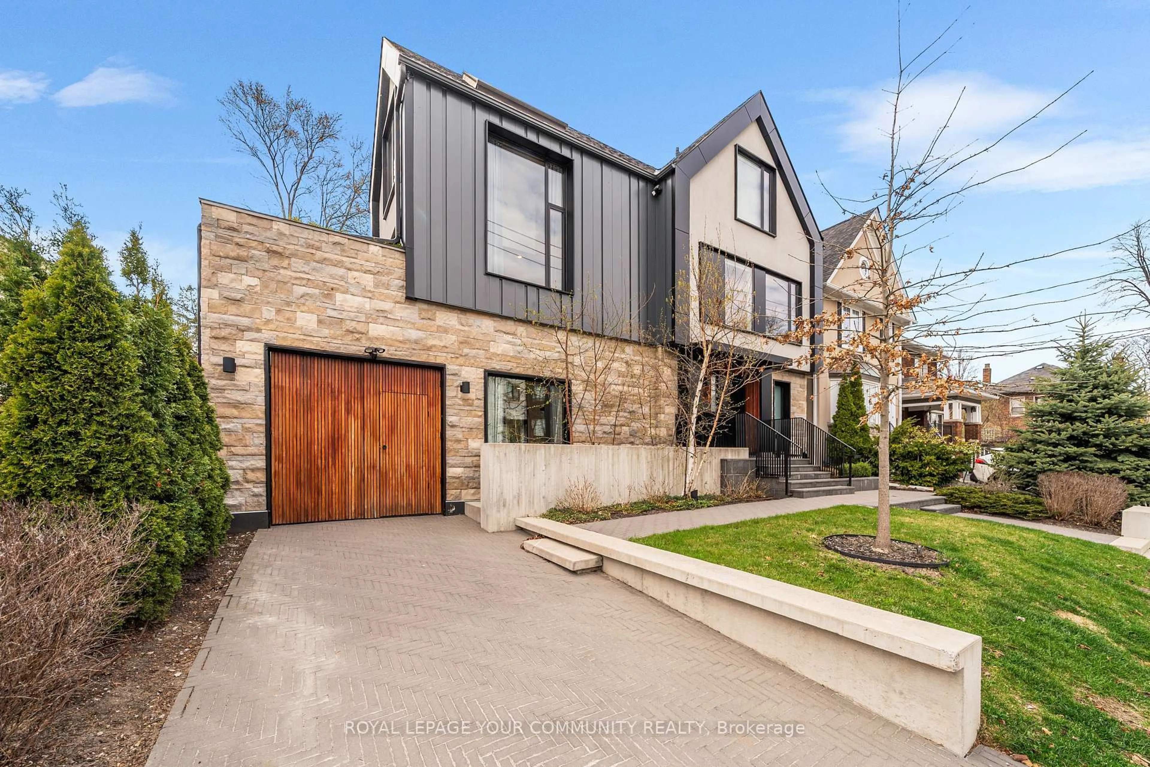 Home with brick exterior material, street for 296 Elm Rd, Toronto Ontario M5M 3V2