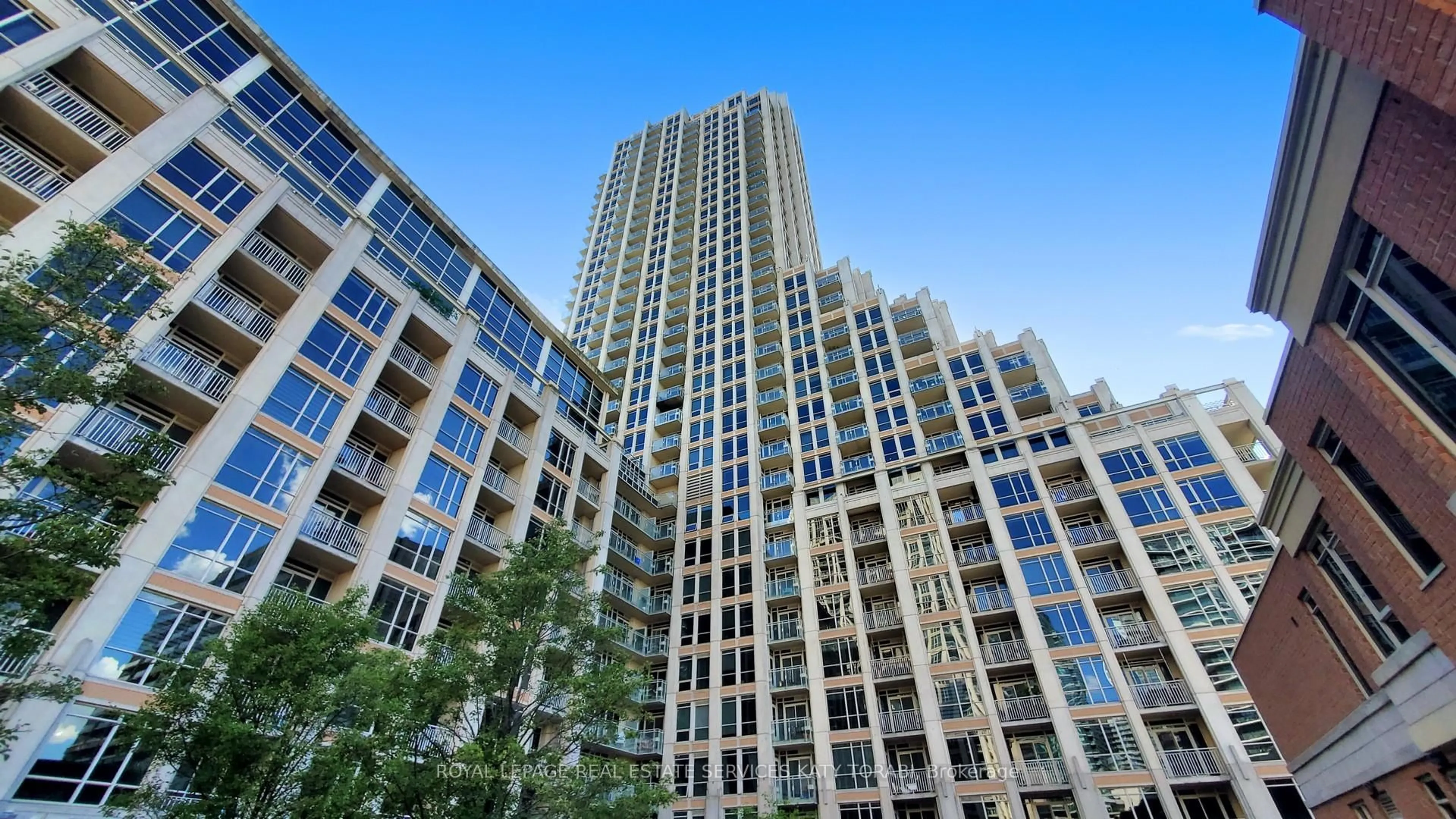 Patio, city buildings view from balcony for 628 Fleet St #PH01, Toronto Ontario M5V 1A8