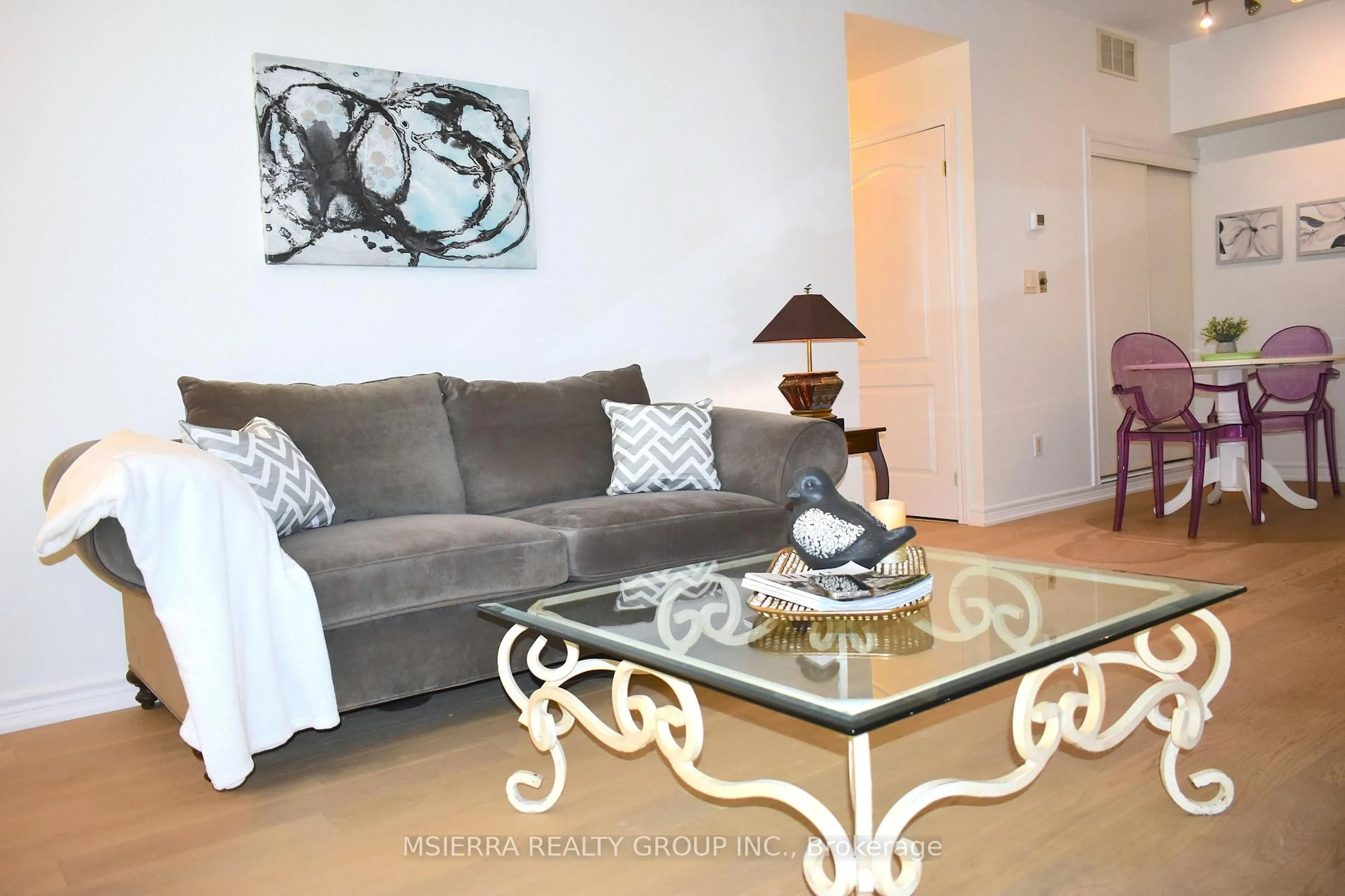 Living room with furniture, unknown for 65 Cranborne Ave #108, Toronto Ontario M4A 2Y5