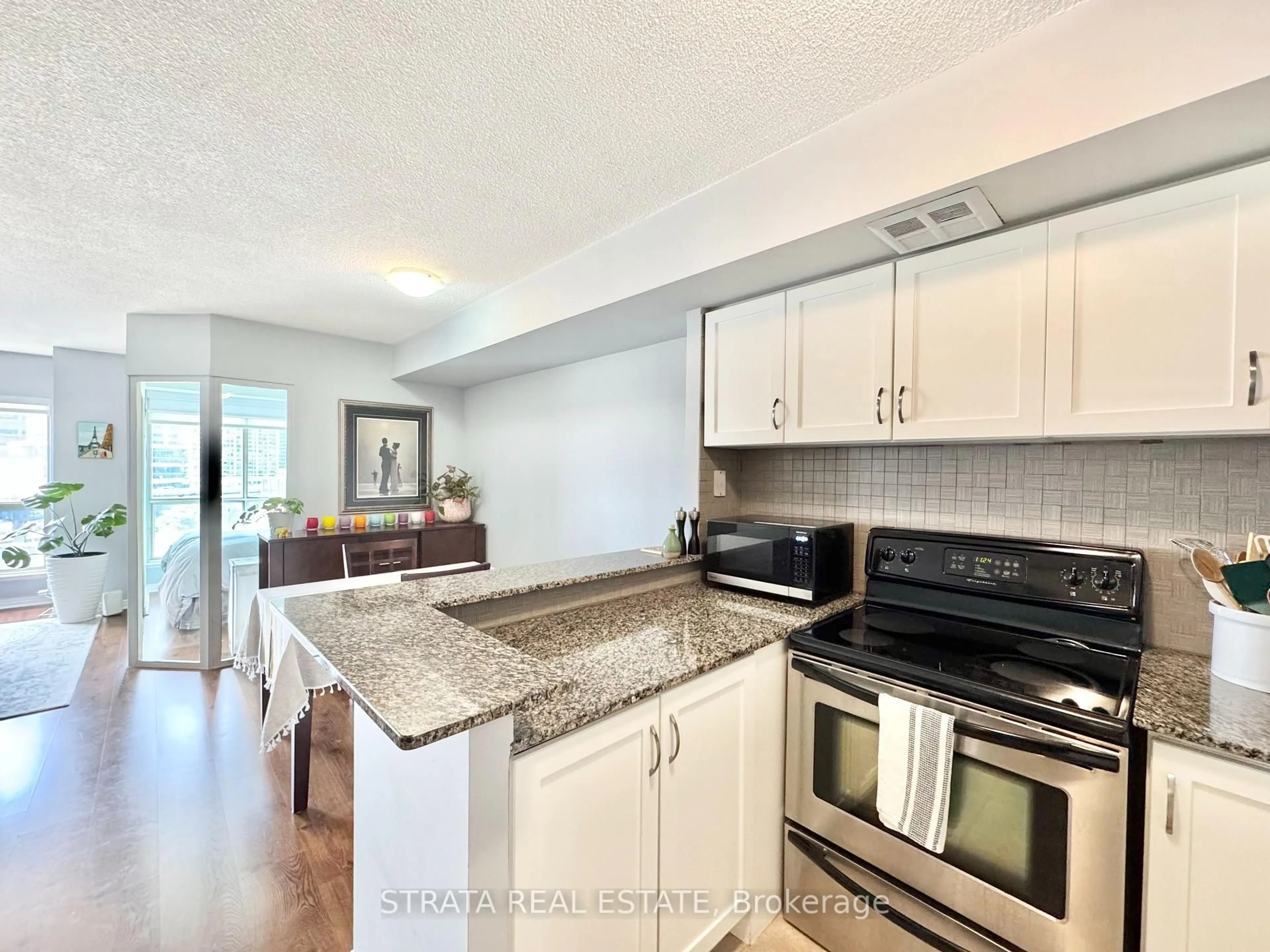 Open concept kitchen, unknown for 25 The Esplanade #621, Toronto Ontario M5E 1W5
