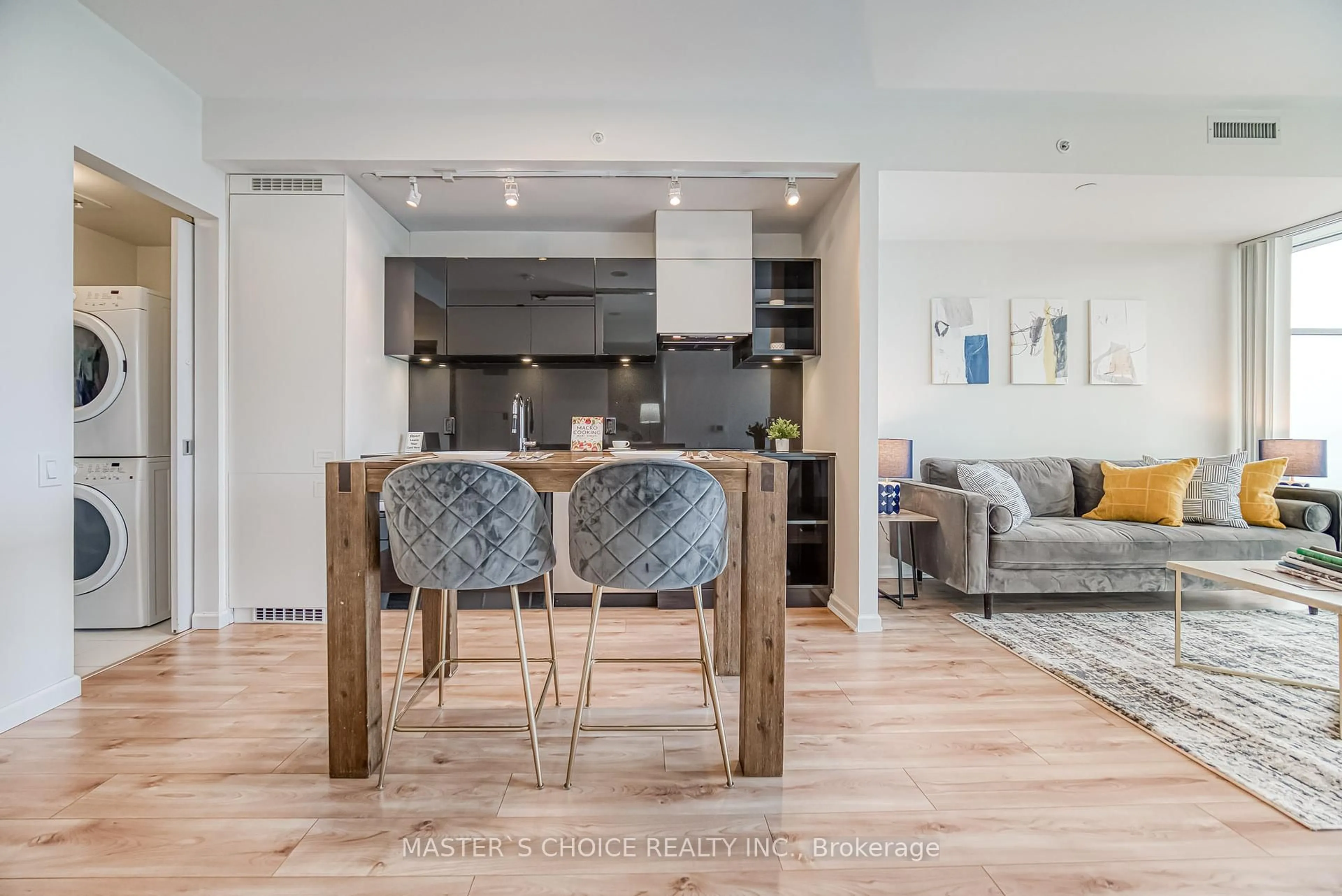 Open concept kitchen, wood/laminate floor for 125 Peter St #2806, Toronto Ontario M5V 2G9