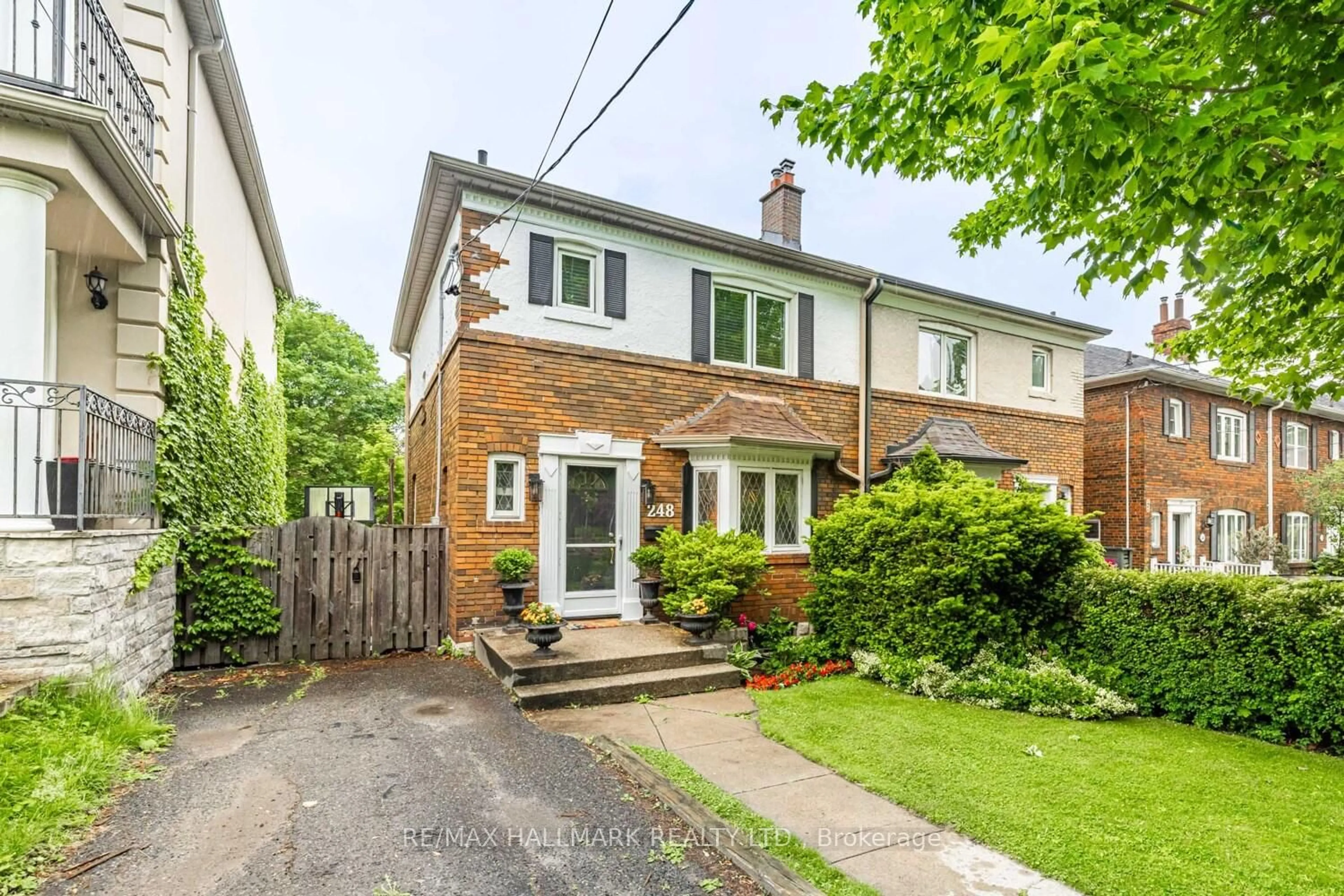 Home with brick exterior material, street for 248 CASTLEFIELD Ave, Toronto Ontario M4R 1G7