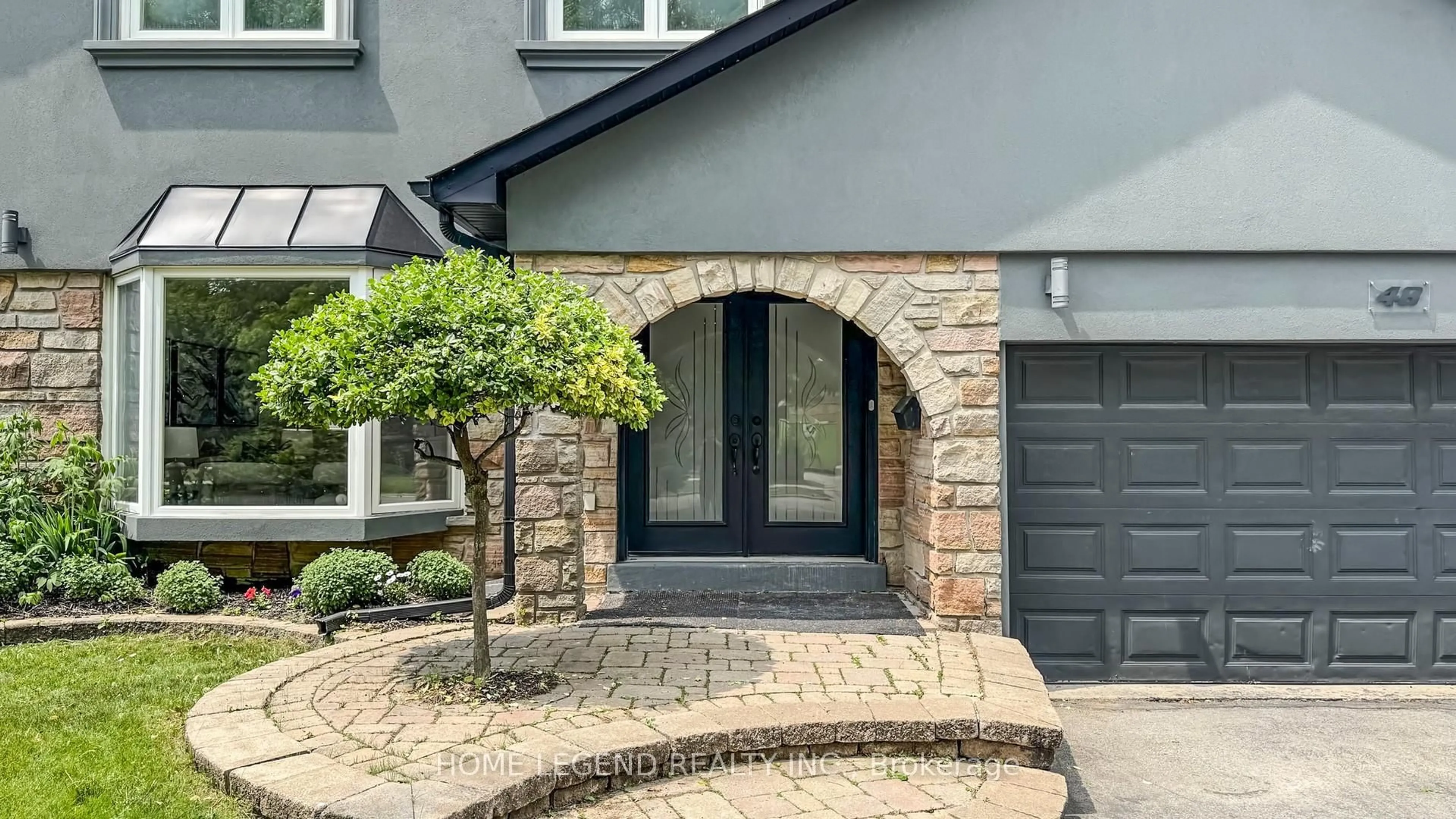 Home with brick exterior material, street for 48 Avonwick Gate, Toronto Ontario M3A 2M6