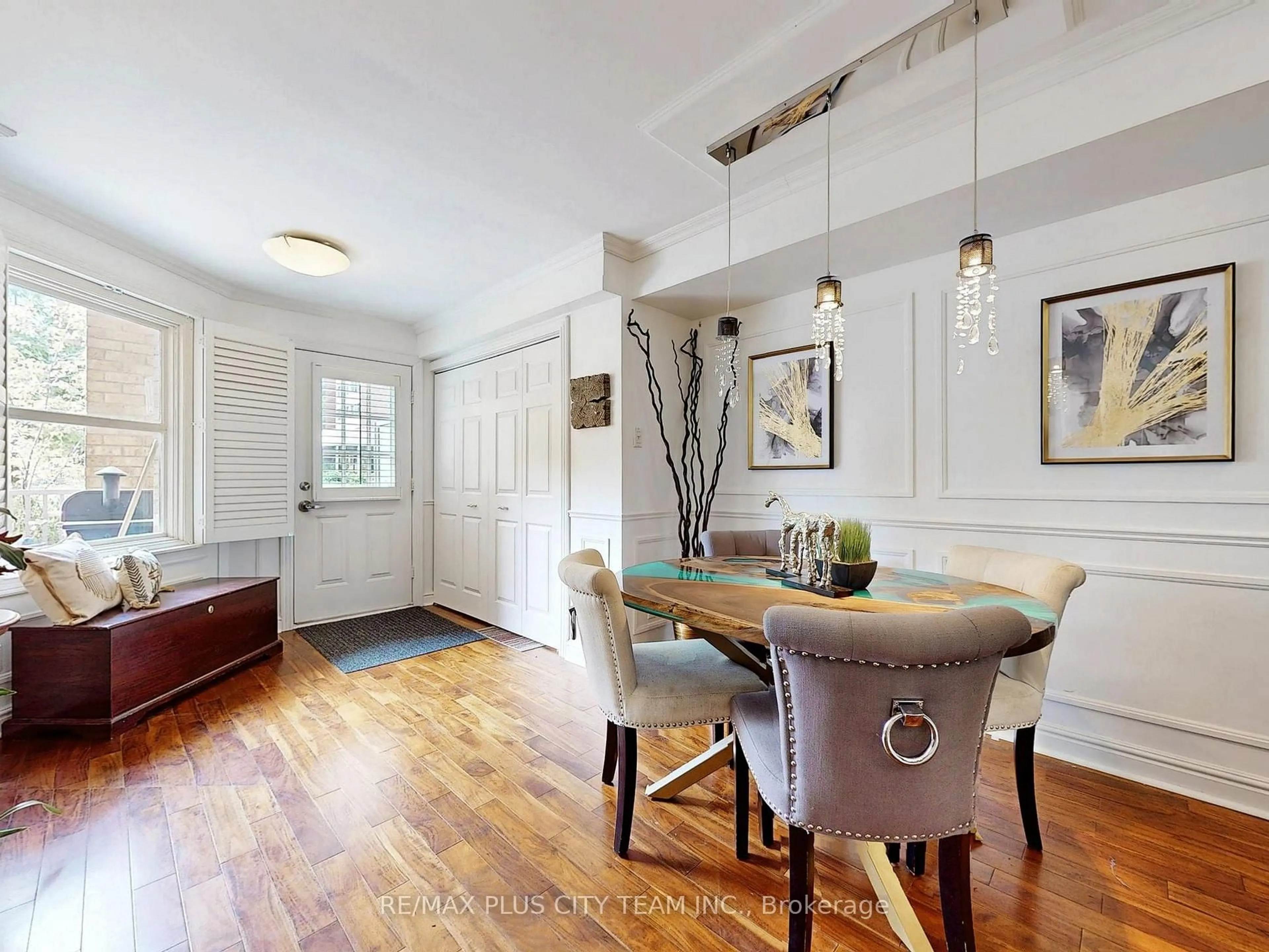 Dining room, wood/laminate floor for 60 Homewood Ave #TH 112, Toronto Ontario M4Y 2X4