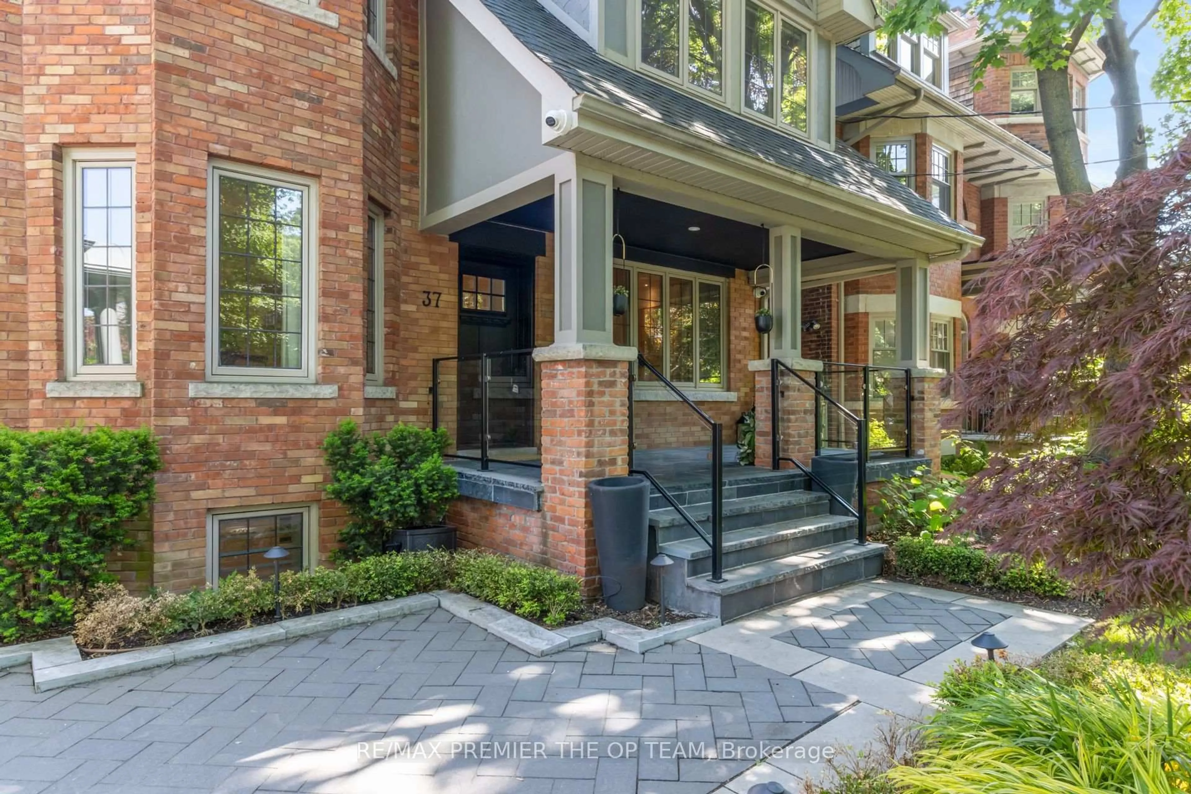 Home with brick exterior material, street for 37 St Andrews Gdns, Toronto Ontario M4W 2C9
