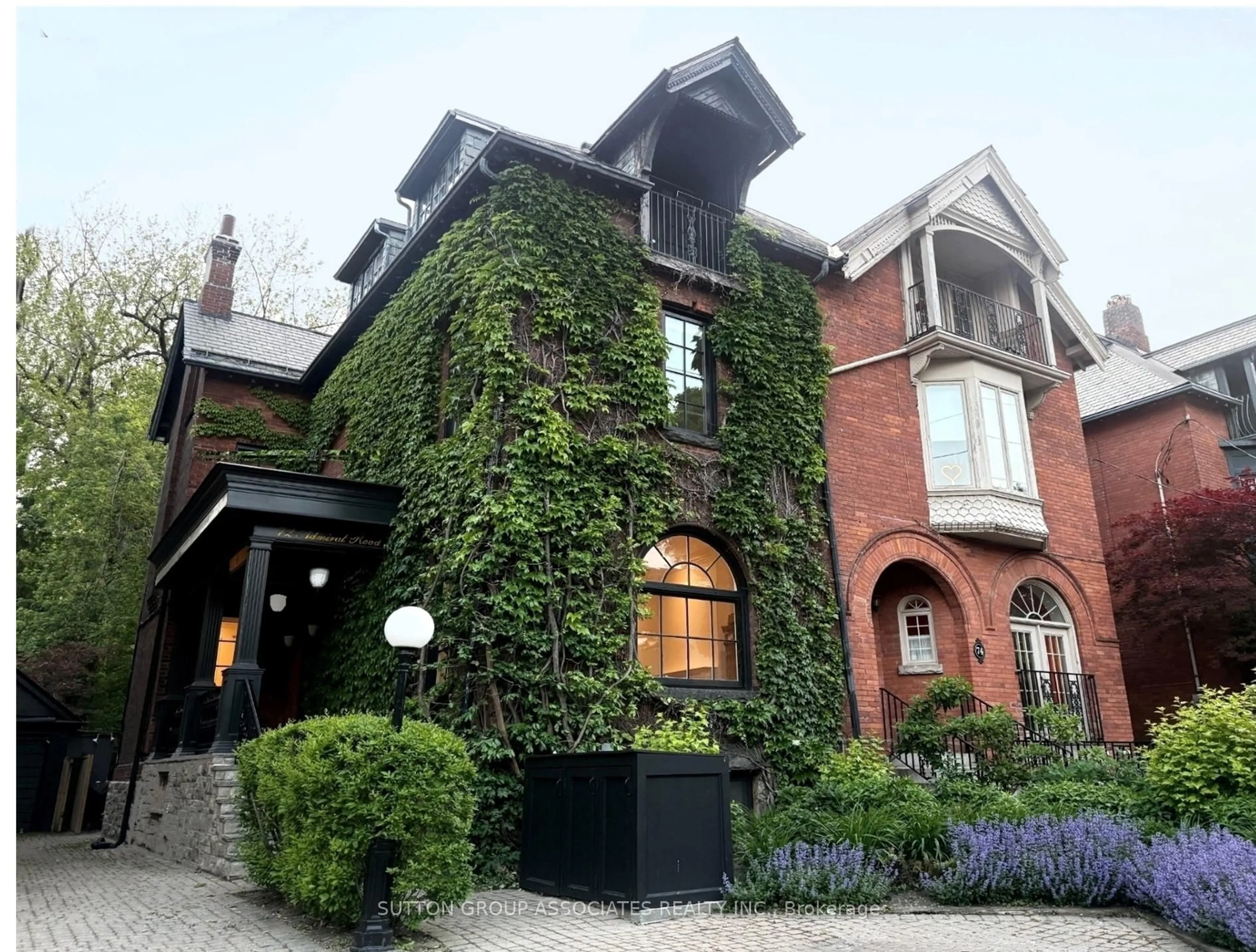 Home with brick exterior material, street for 72 Admiral Rd, Toronto Ontario M5R 2L5
