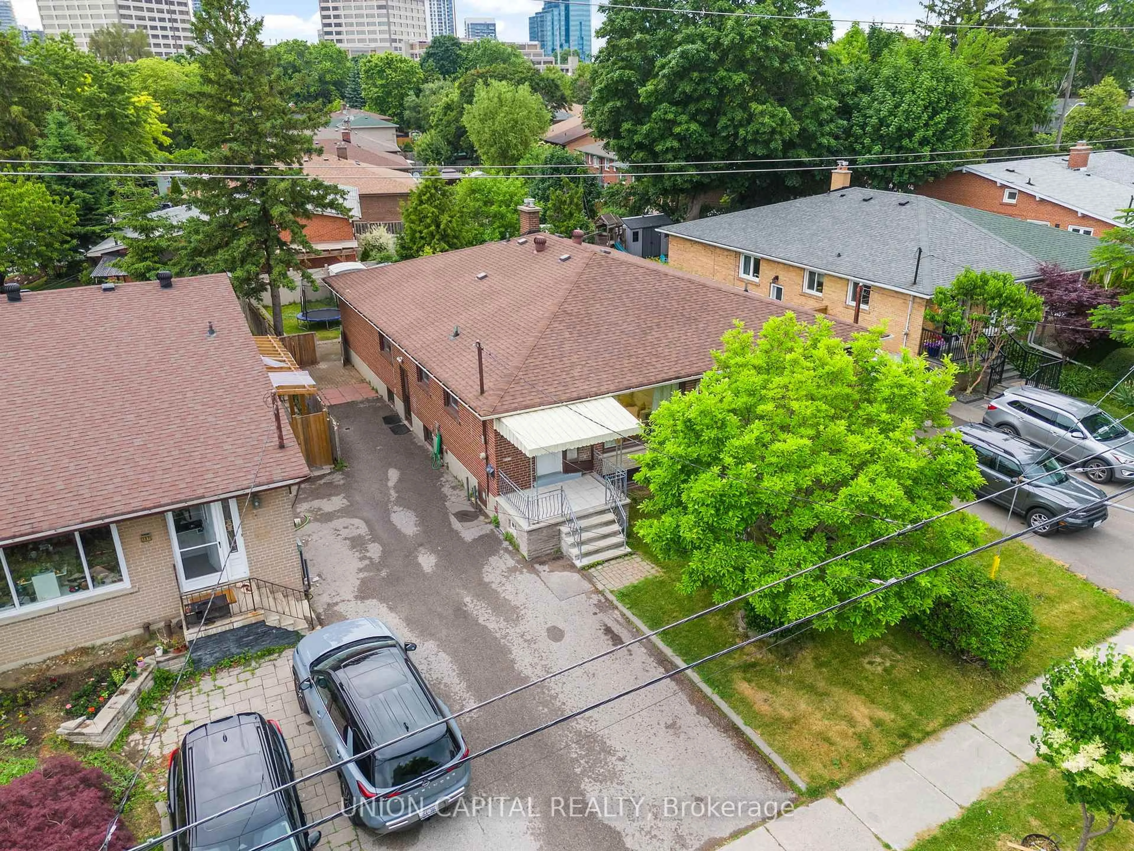 A pic from outside/outdoor area/front of a property/back of a property/a pic from drone, city buildings view from balcony for 155 Roywood Dr, Toronto Ontario M3A 2E3