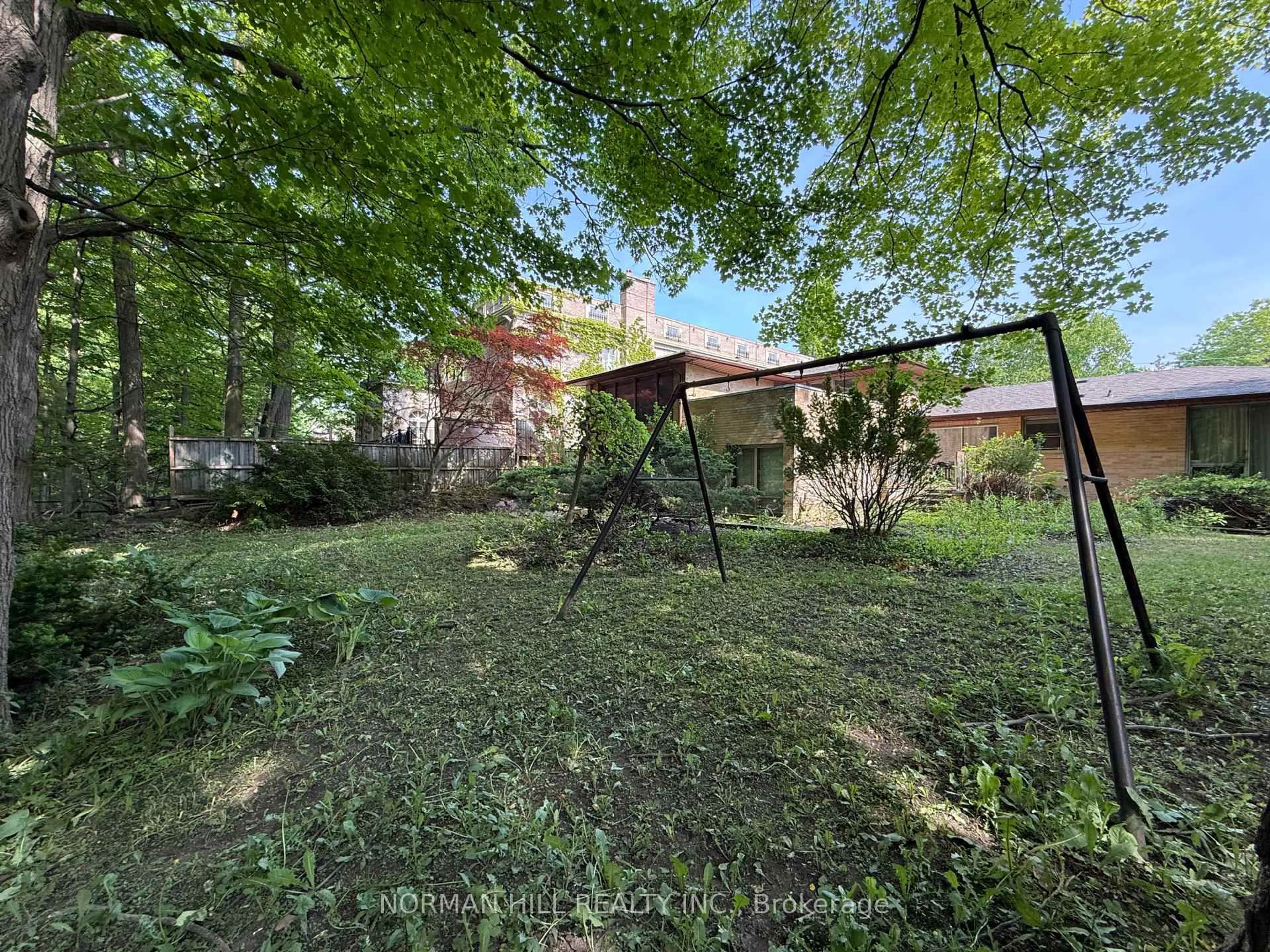 A pic from outside/outdoor area/front of a property/back of a property/a pic from drone, forest/trees view for 49 Timberlane Dr, Toronto Ontario M3H 1J3