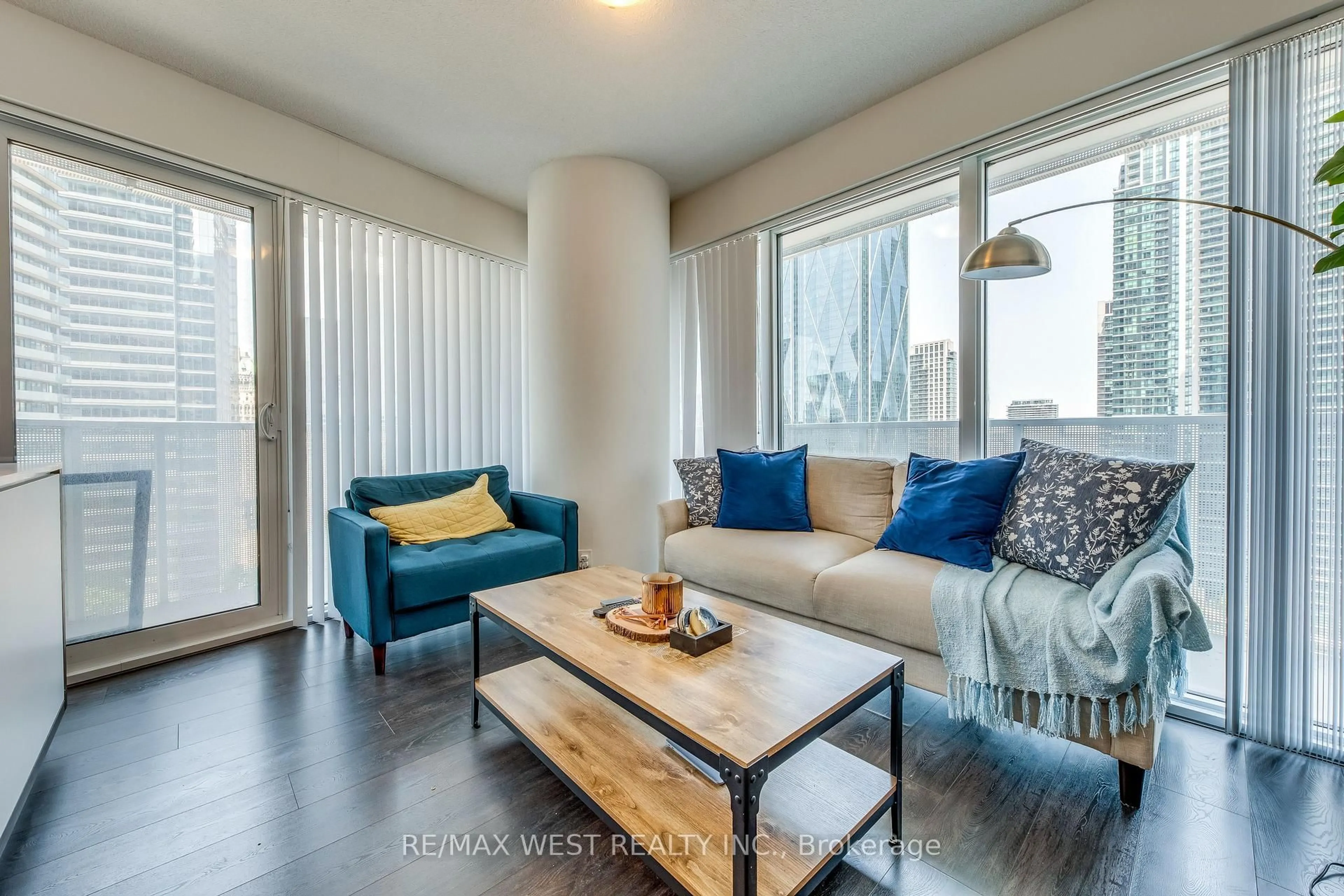 Living room with furniture, wood/laminate floor for 100 Harbour St #2004, Toronto Ontario M5J 0B5