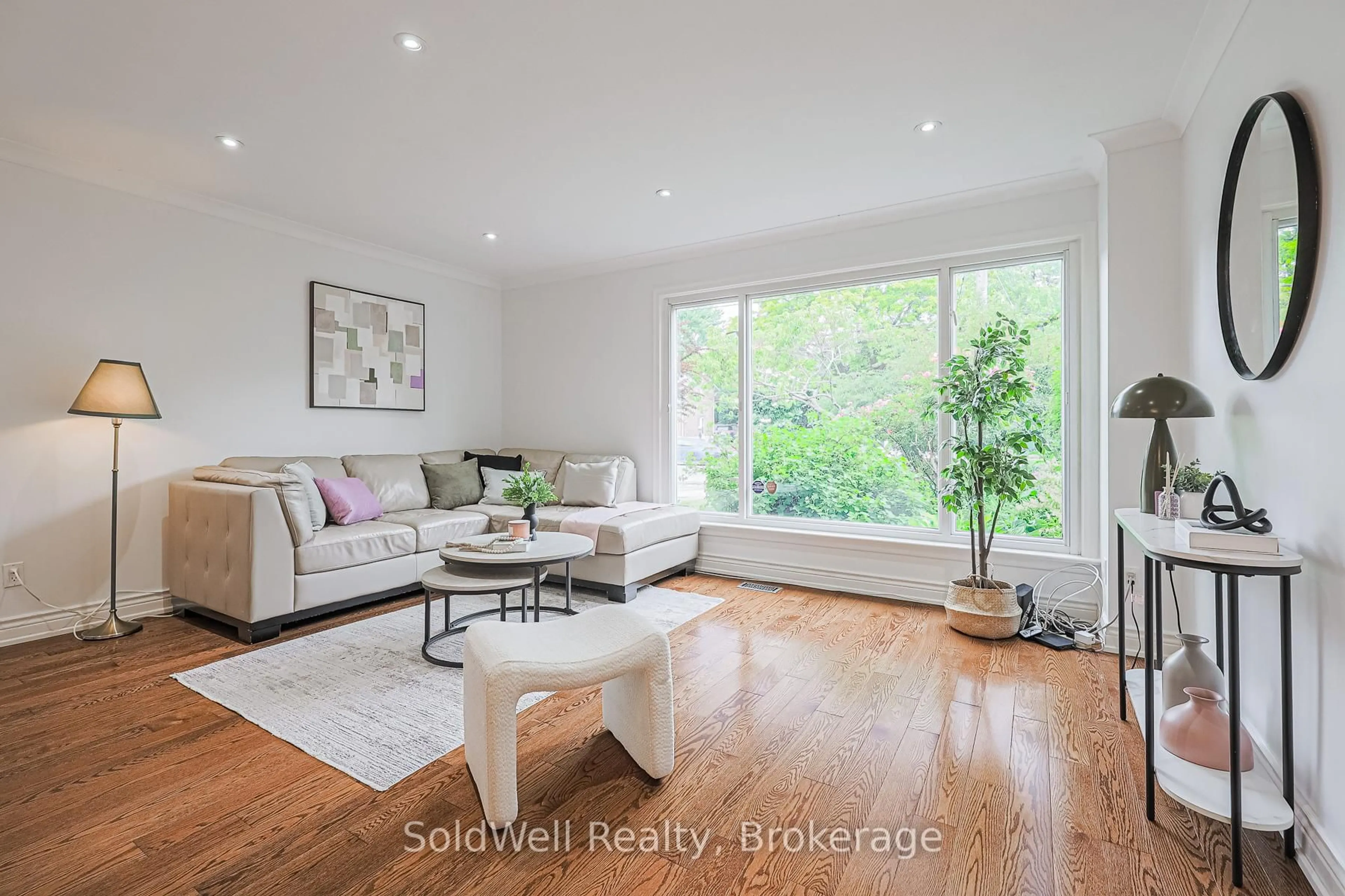 Living room with furniture, wood/laminate floor for 9 Lynedock Cres, Toronto Ontario M3A 2A7