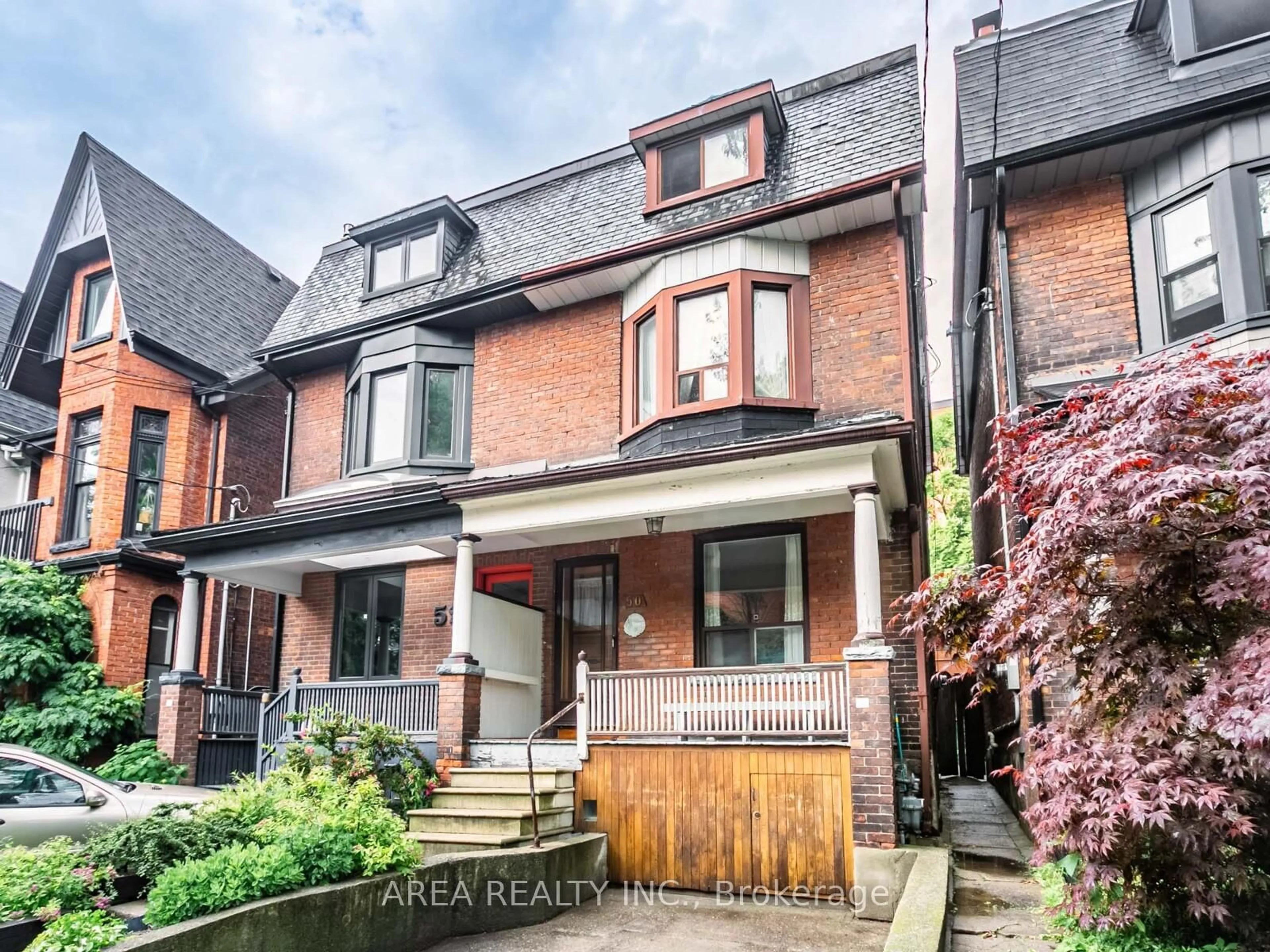 Home with brick exterior material, street for 50 Mackenzie Cres, Toronto Ontario M6J 1T1