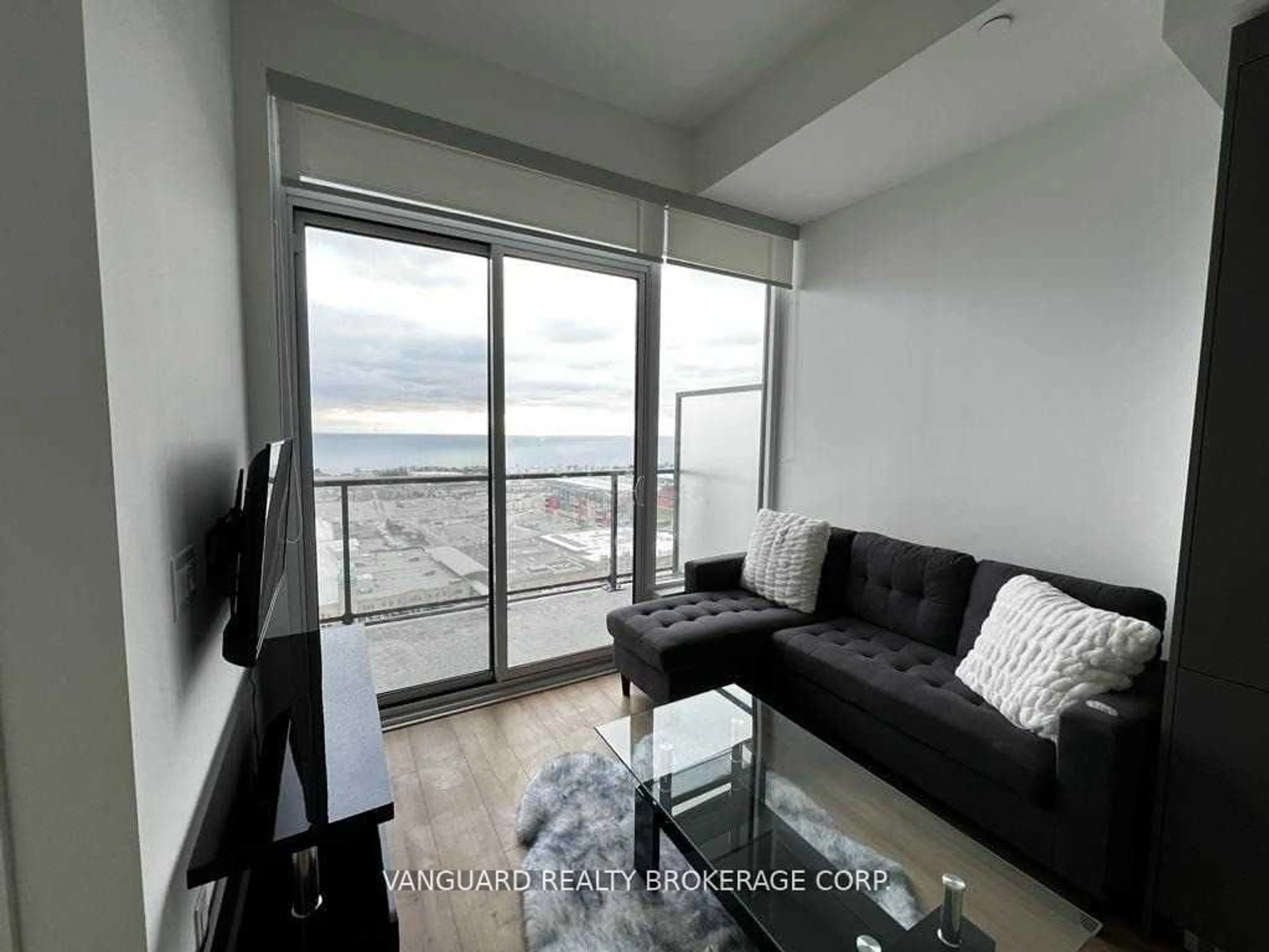 Living room with furniture, wood/laminate floor for 135 East Liberty St #LP10, Toronto Ontario M6K 0G7