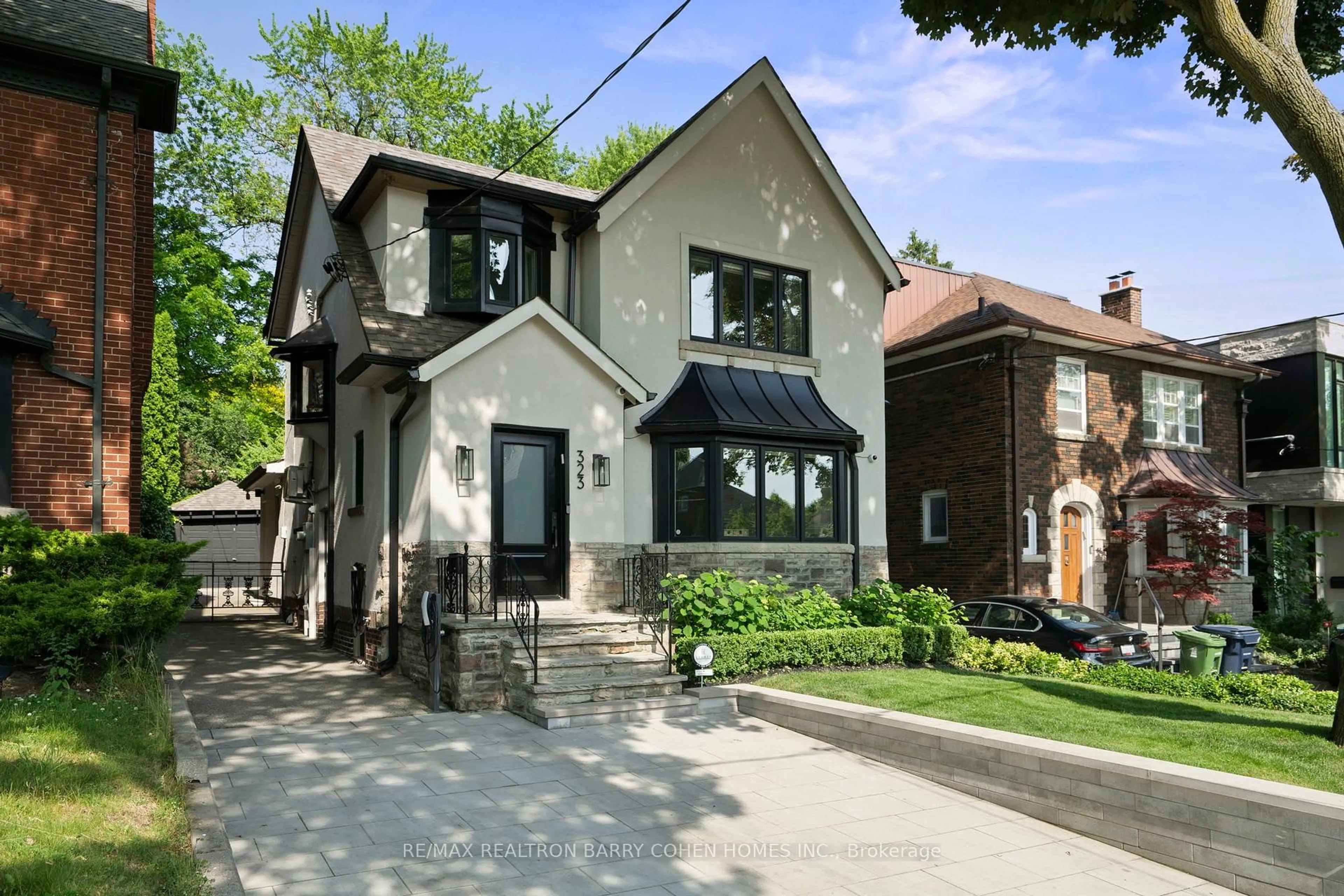 Home with brick exterior material, street for 323 Warren Rd, Toronto Ontario M5P 2M7